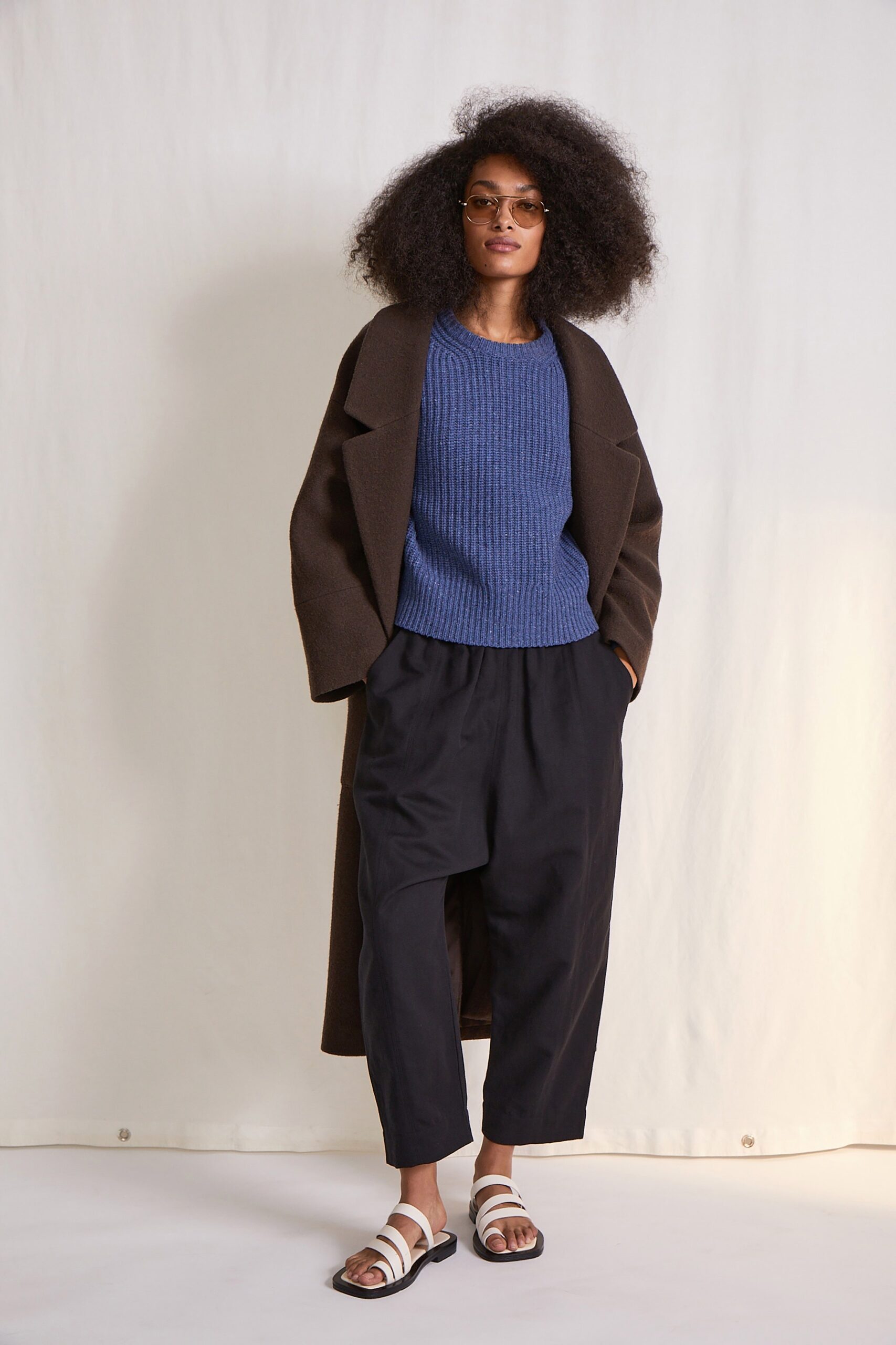 brown wool coat with blue sweater
