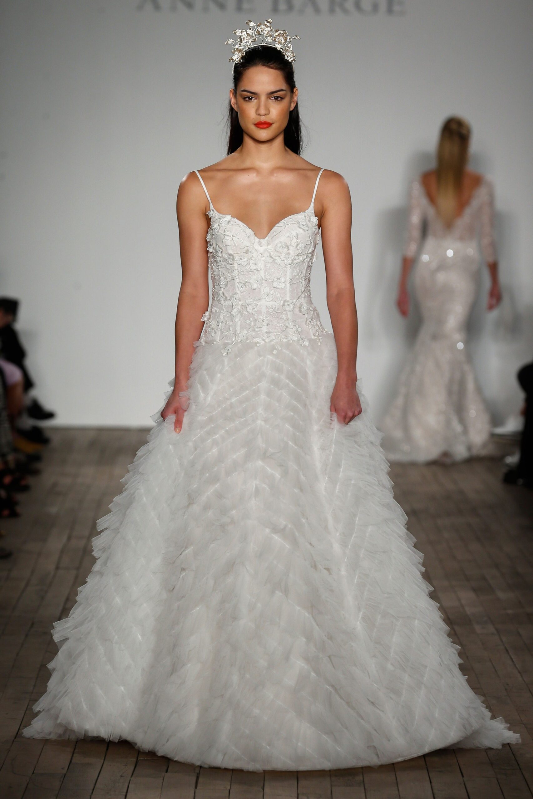 white pleated sleeveless gown