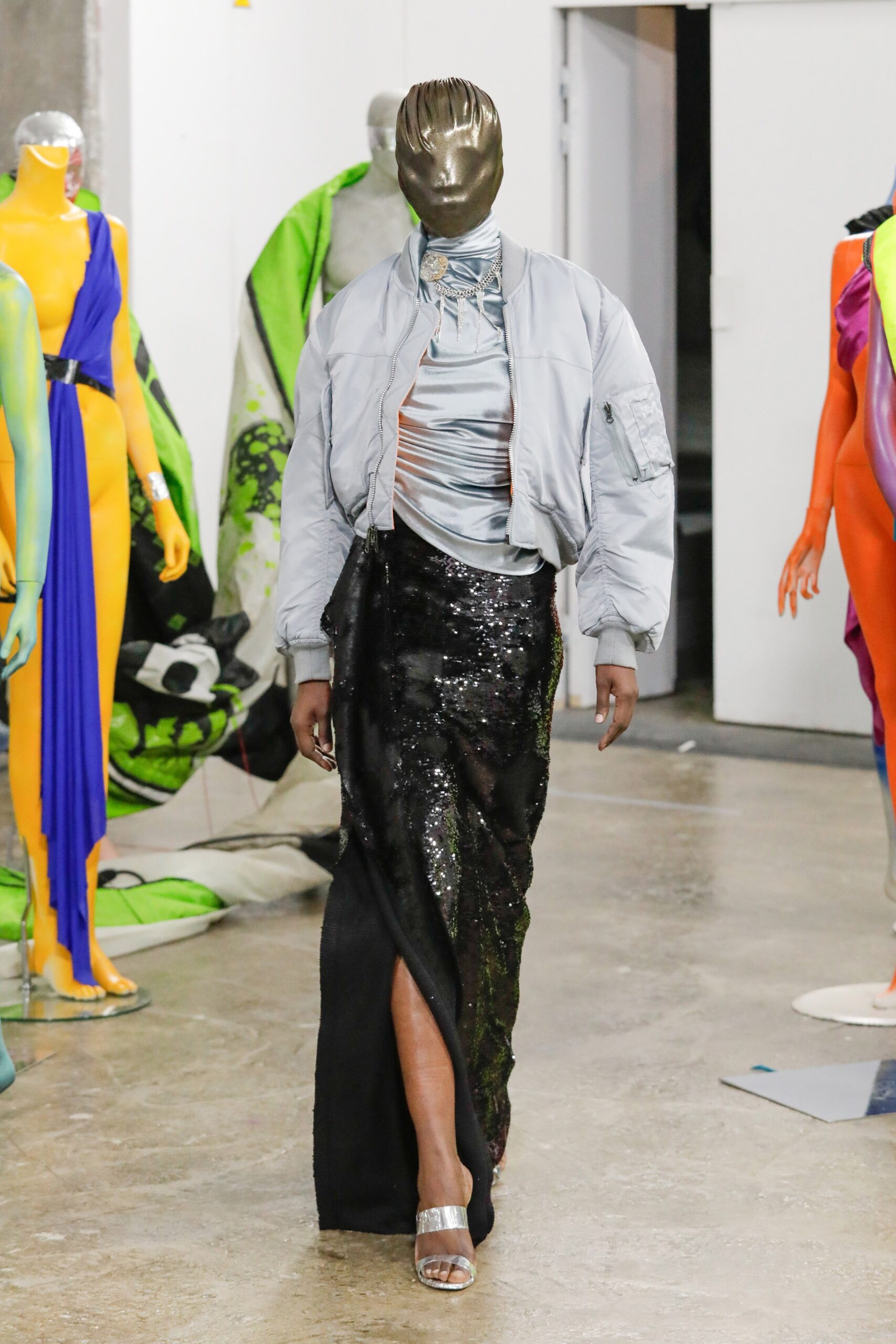 gray jacket with black sequin skirt
