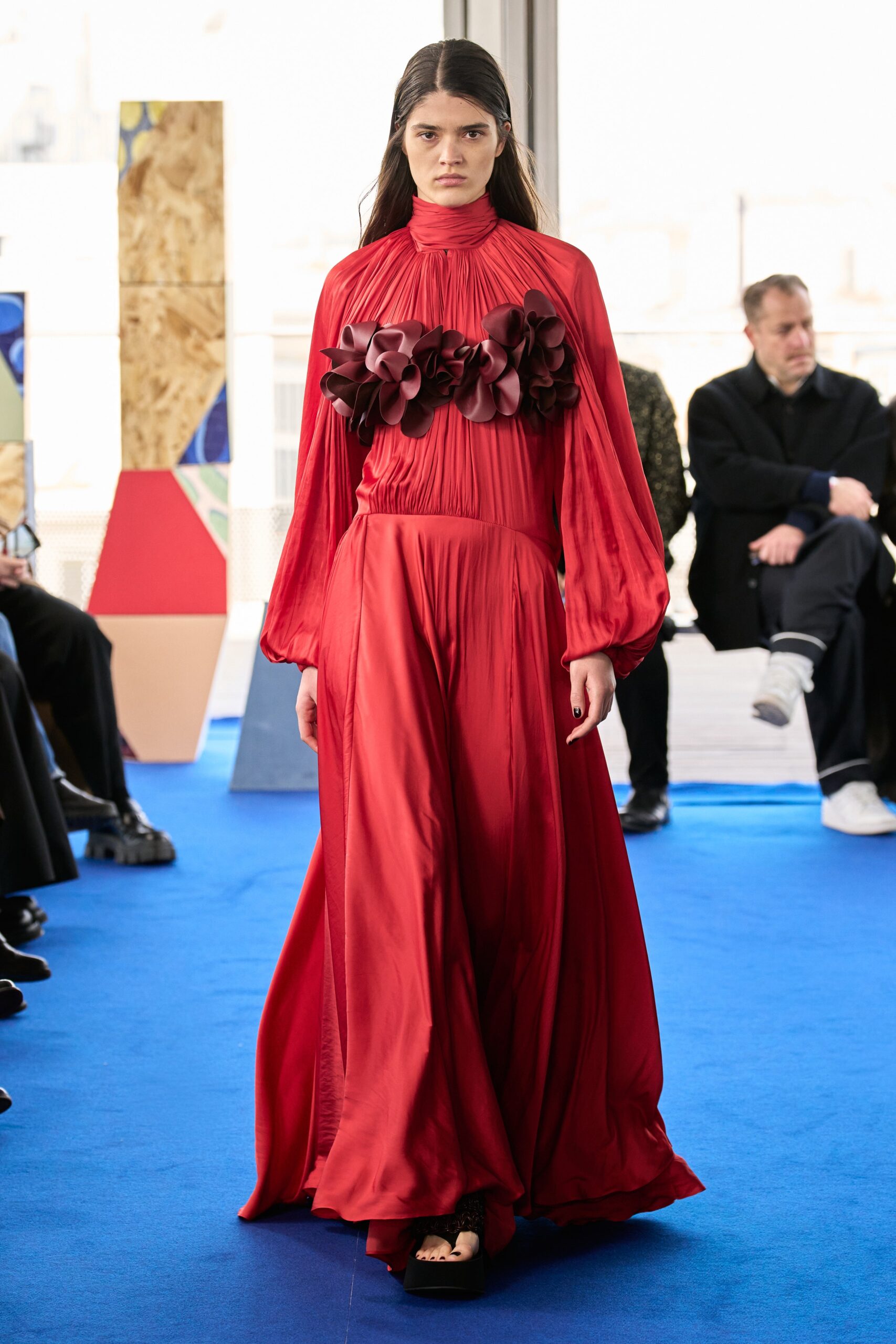 red silk pleated gown