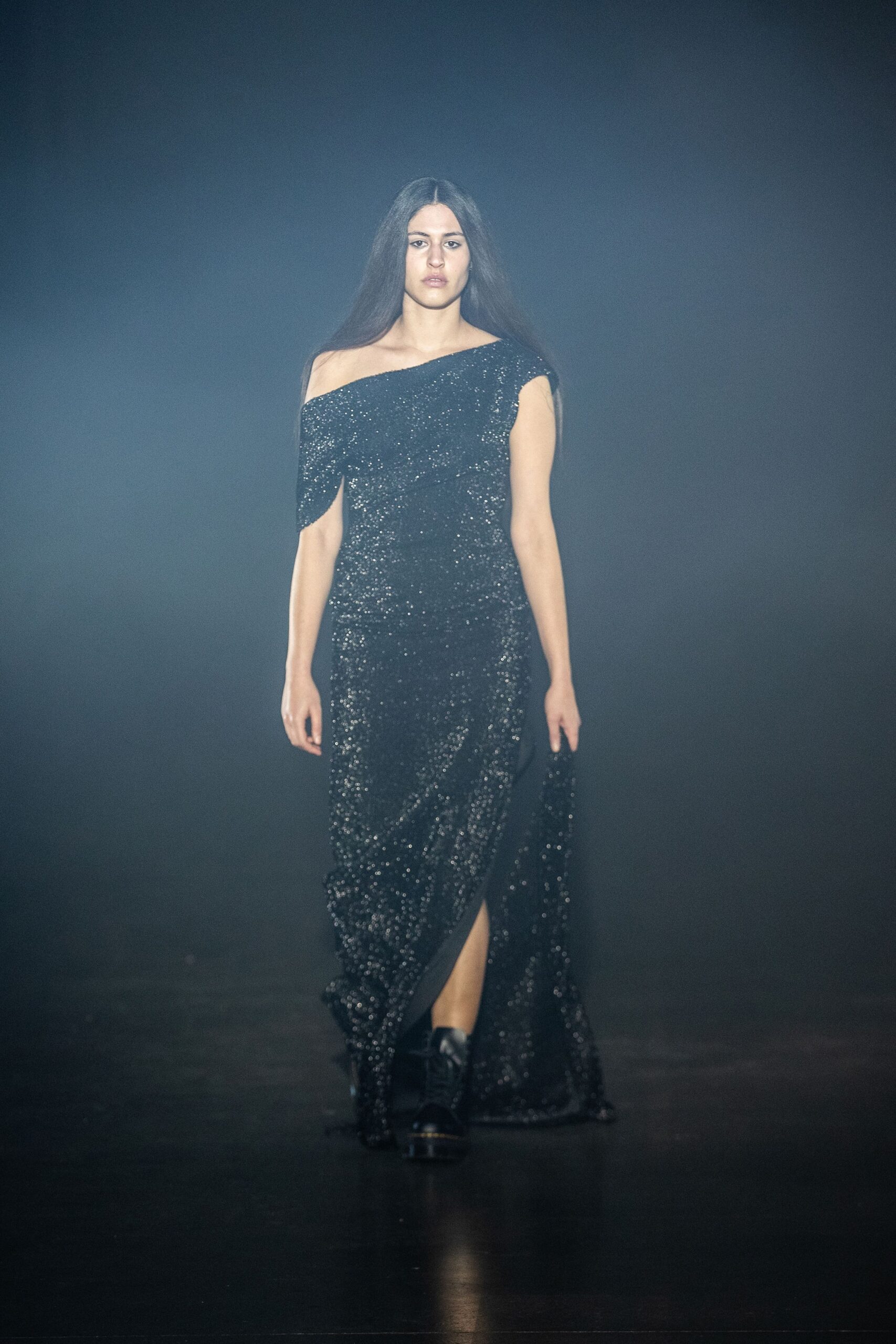 black sequined off-shoulder gown