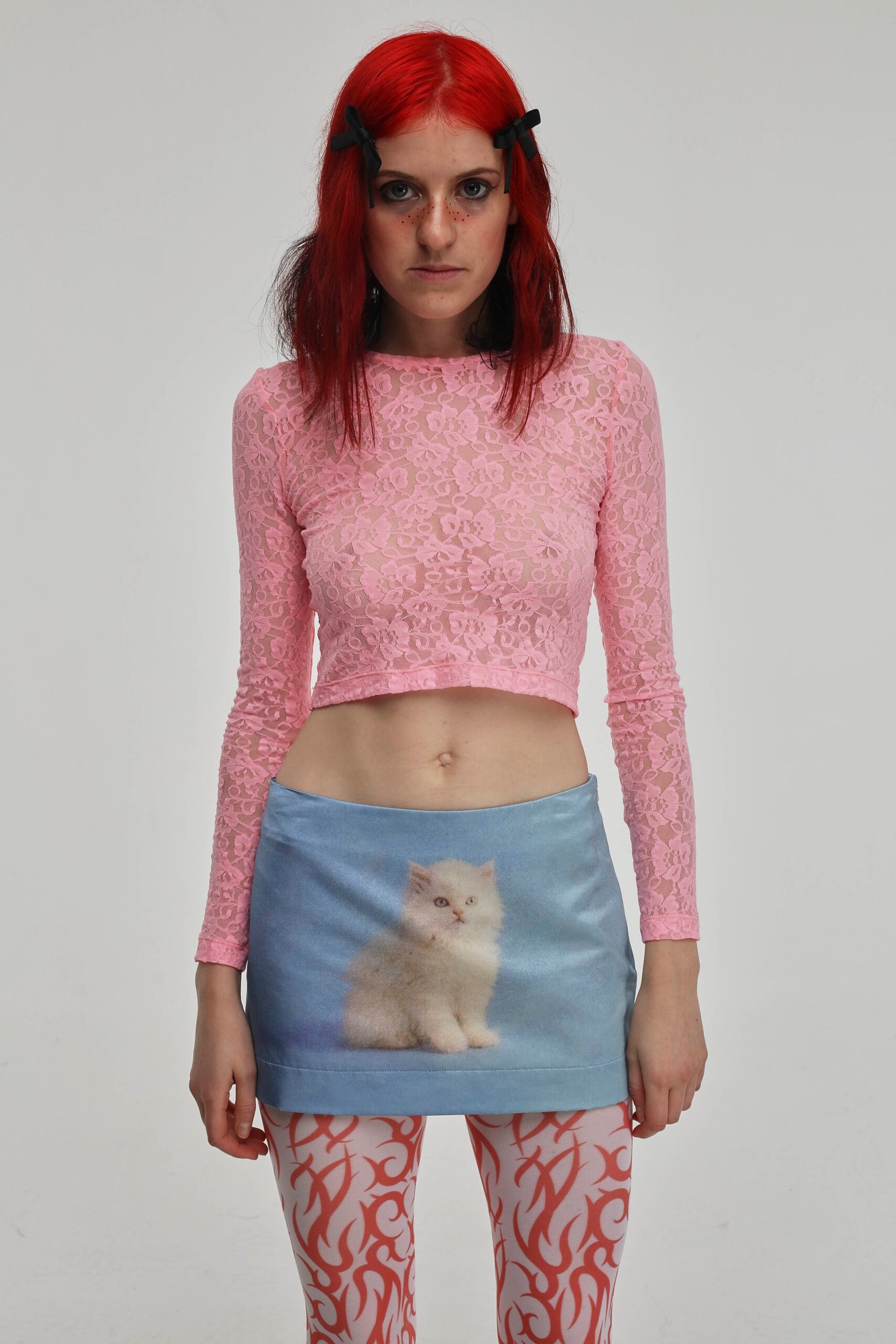 pink lace cropped top with blue printed skirt