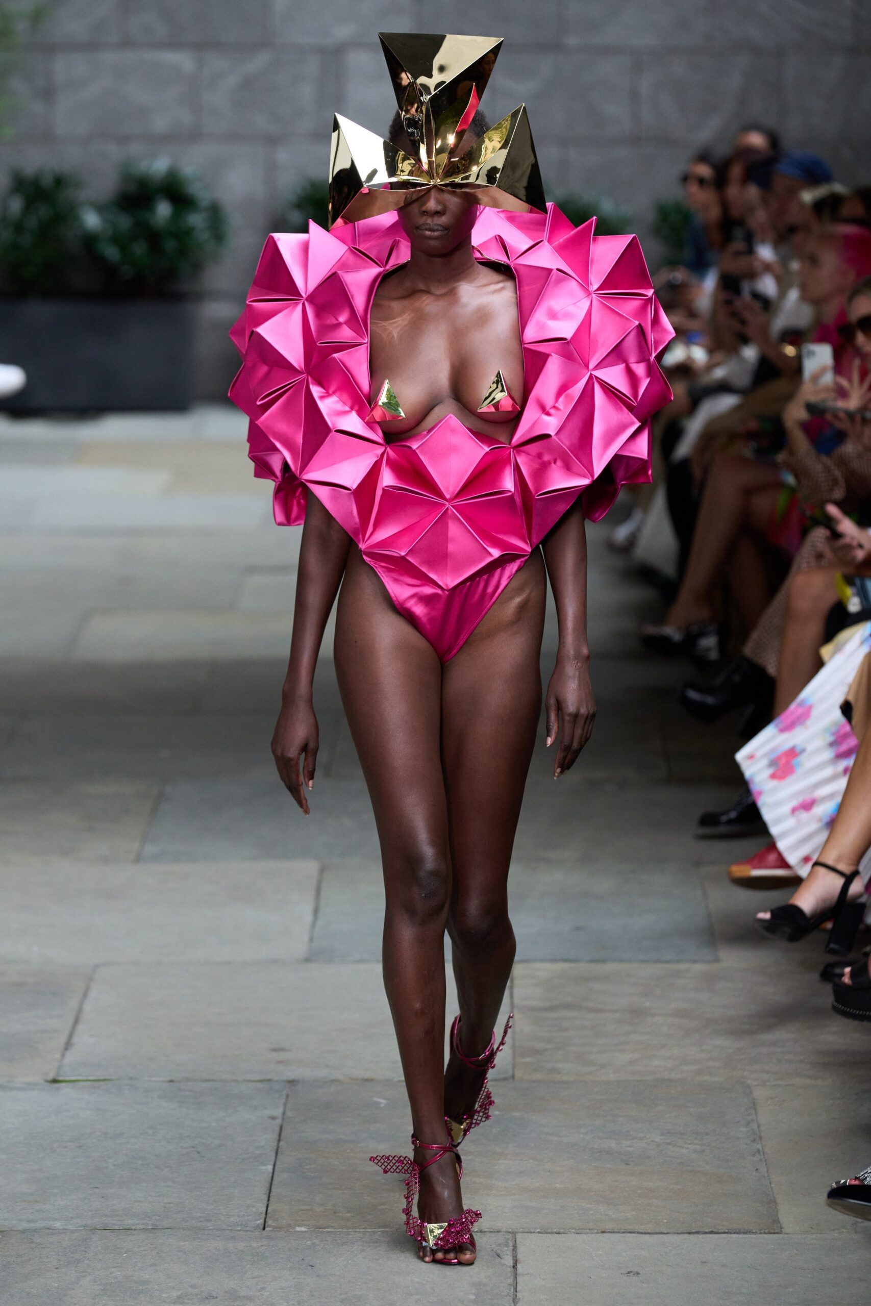 pink cape and green bikini