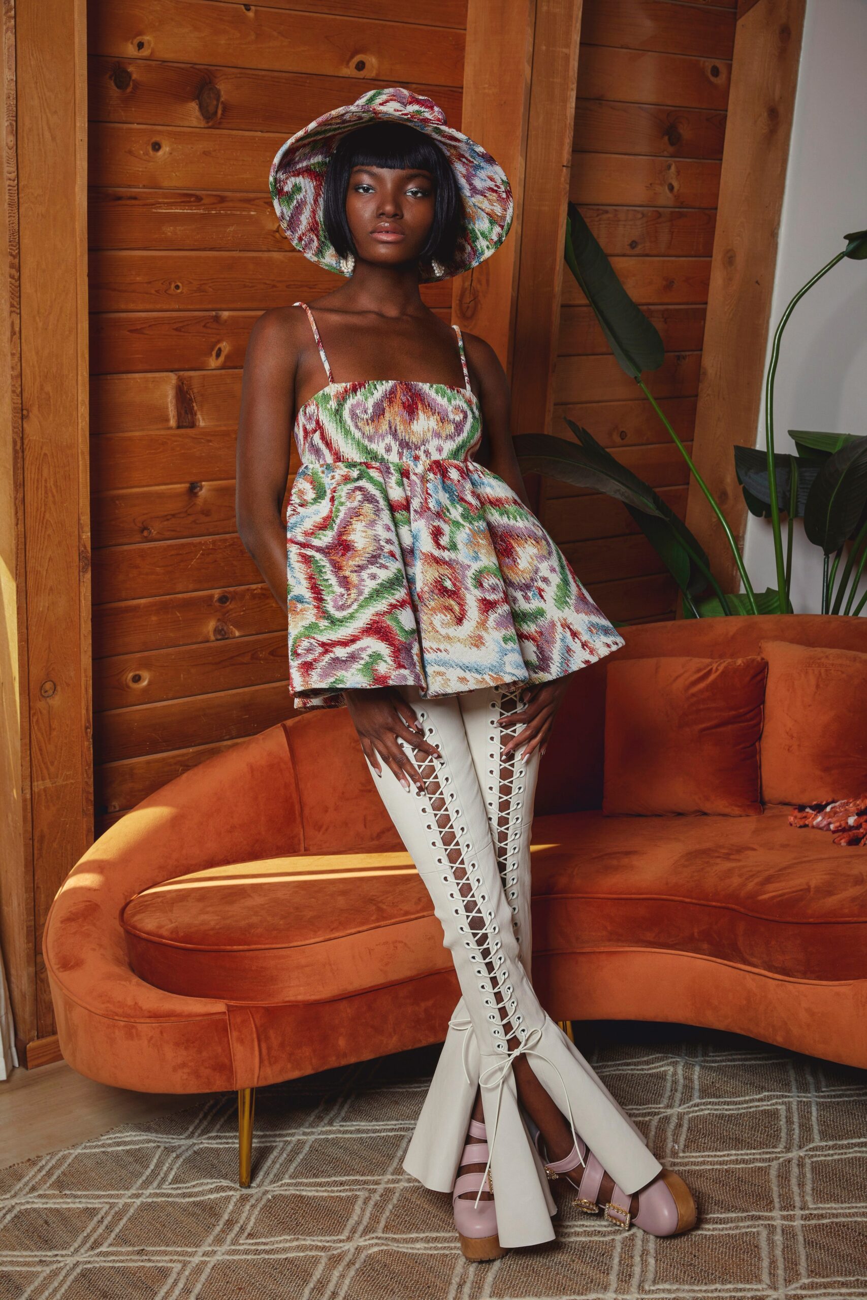 multi-colored ruffled top with flared pants