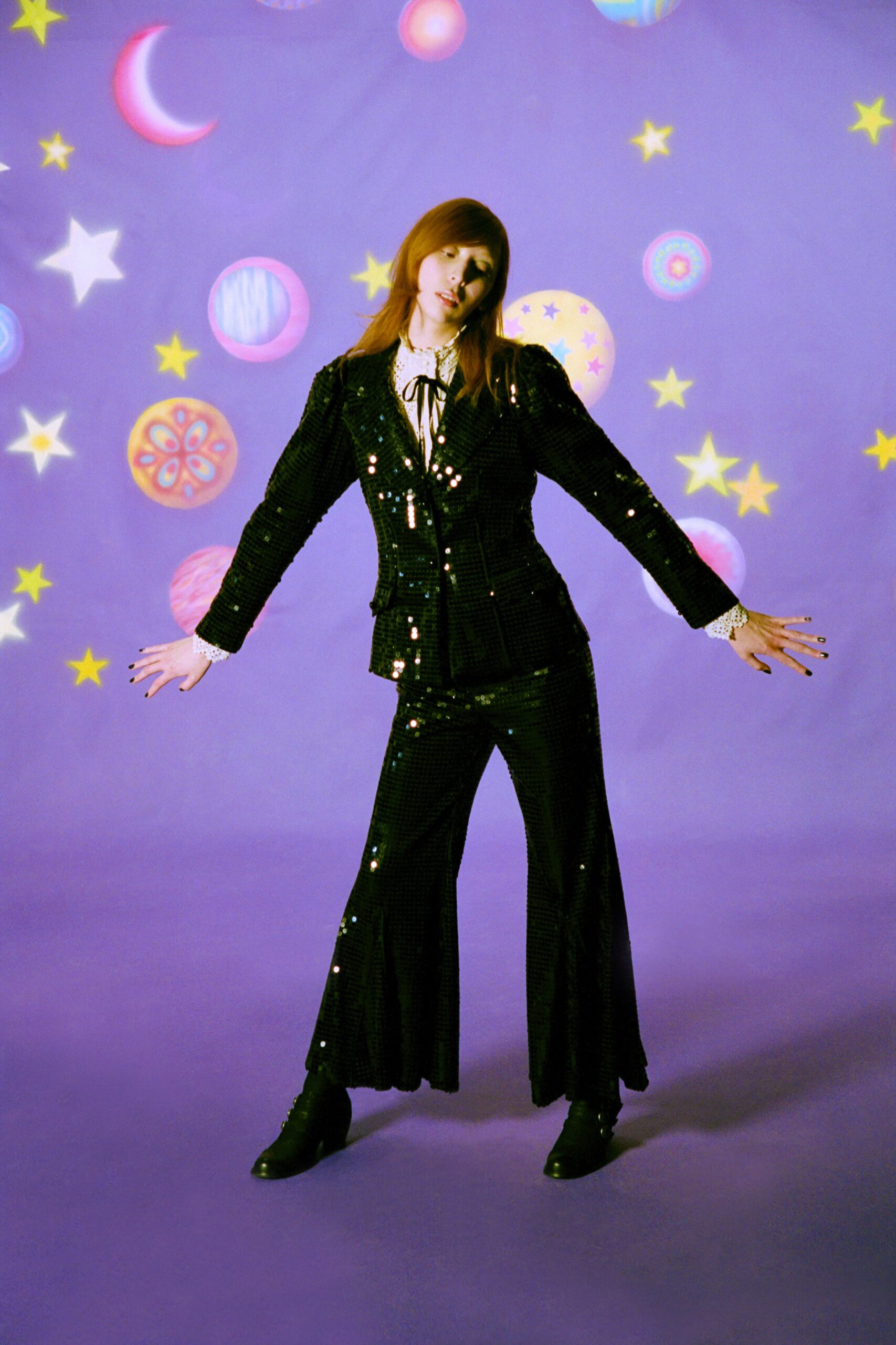 black sequined velvet suit