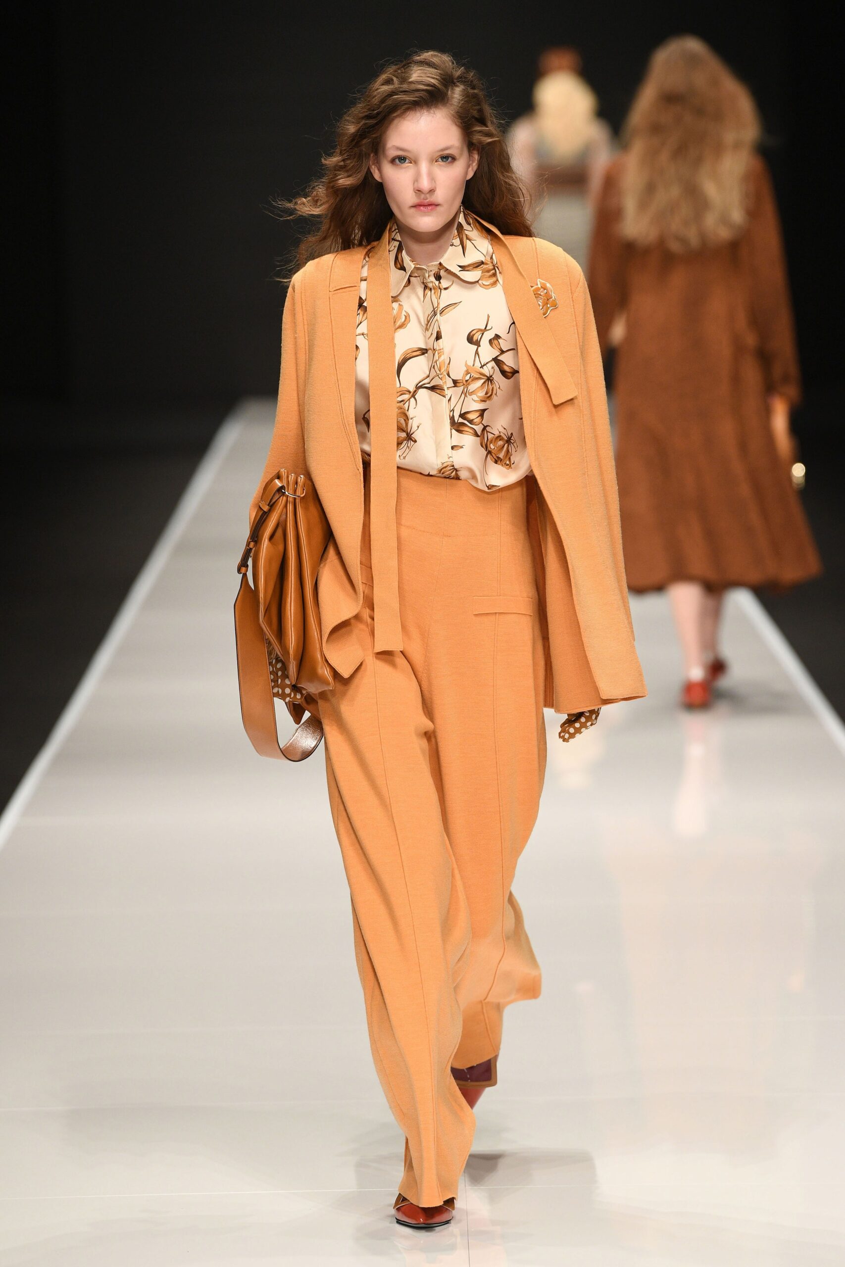 orange tailored blazer and pants