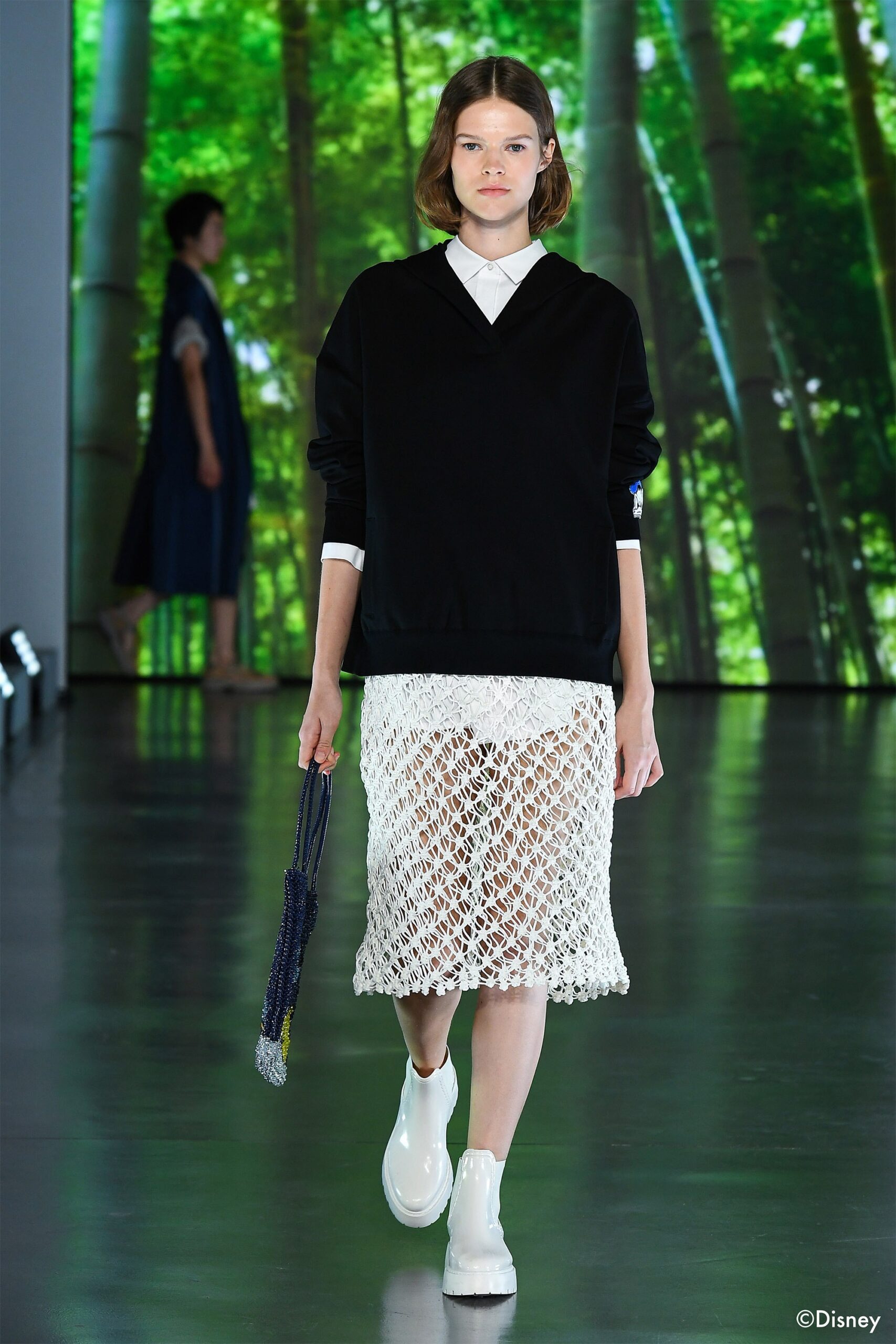 black relaxed sweater with white sheer skirt