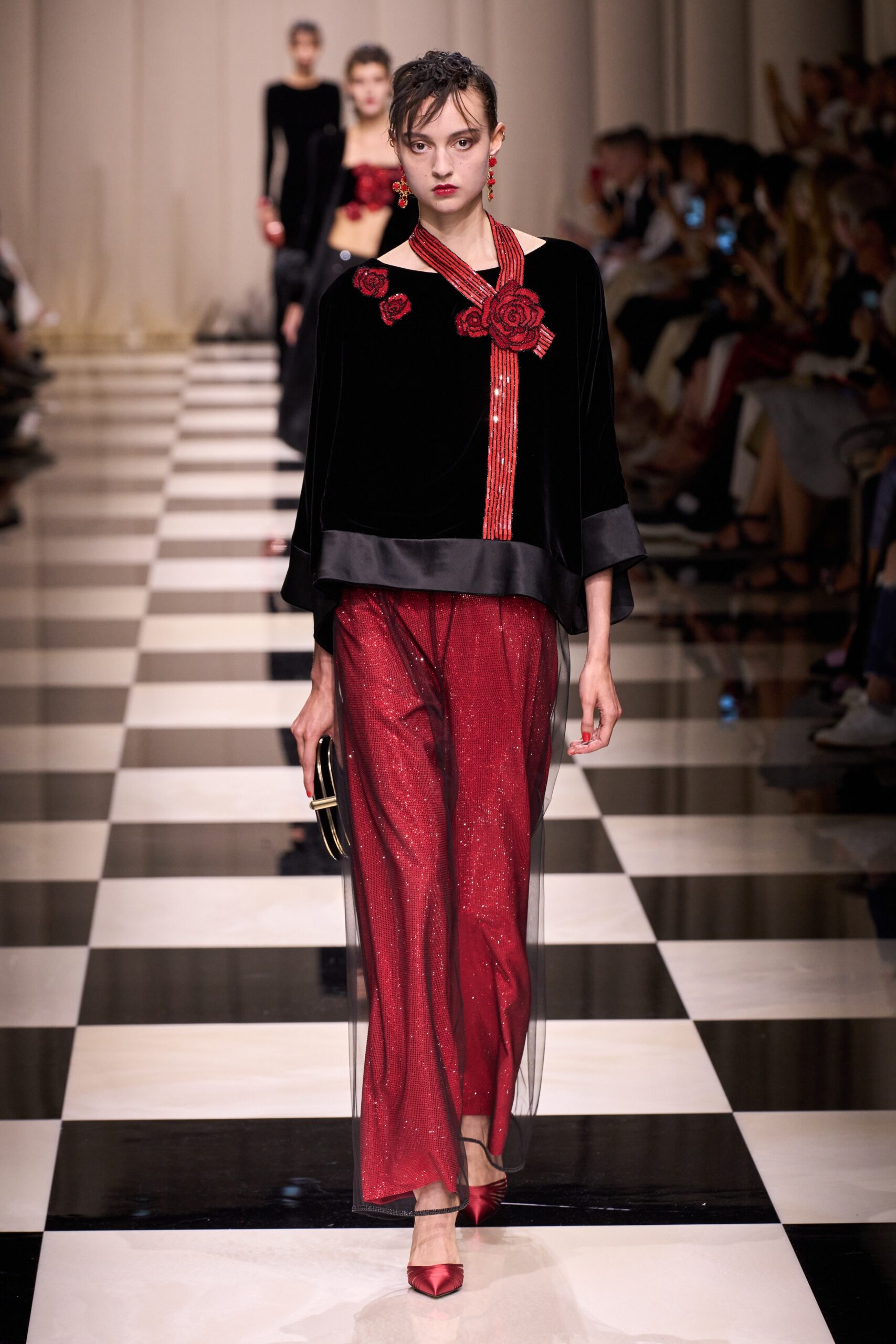 black velvet top with red pants
