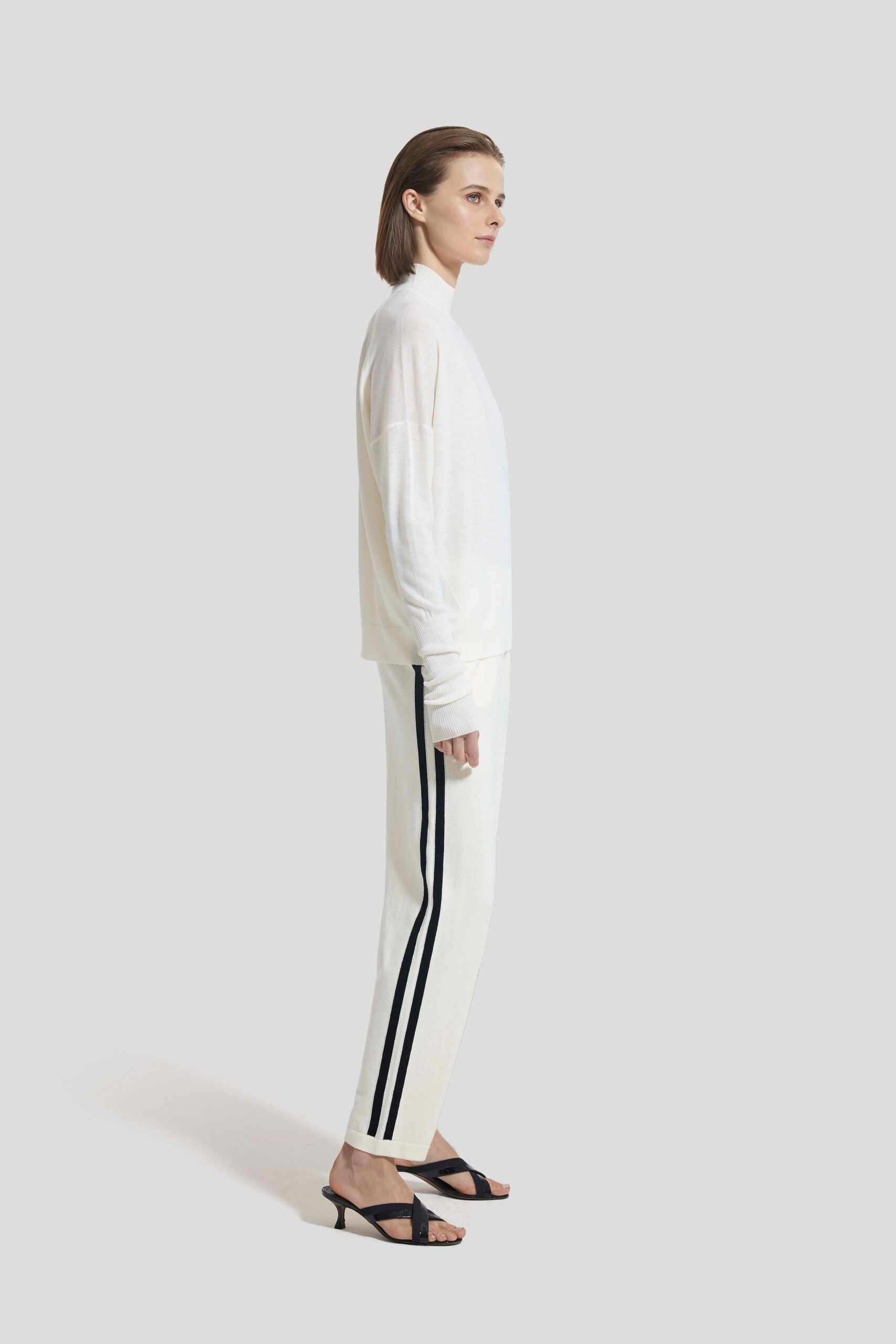 white relaxed top with fitted pants