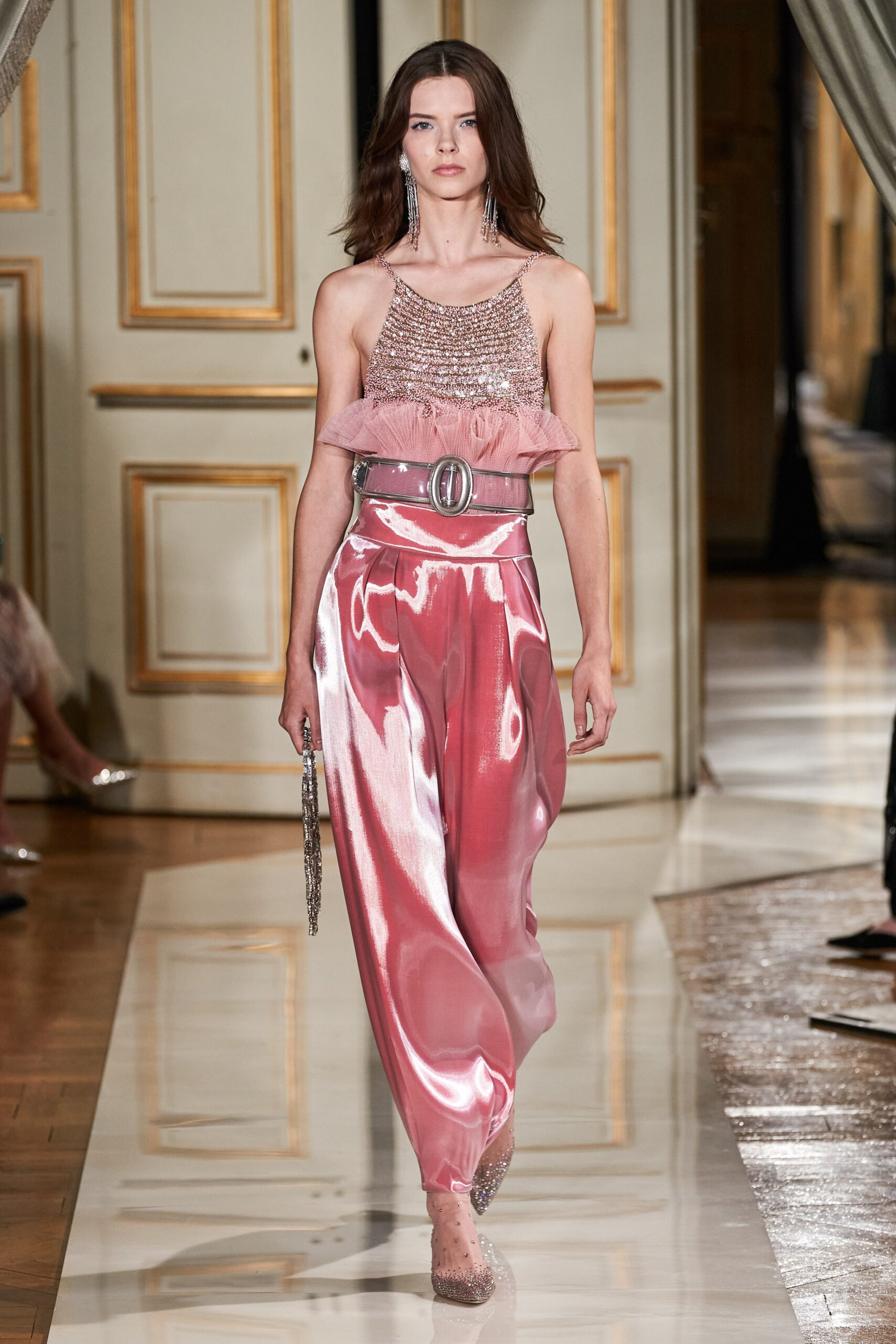 pink silk ruffled top and wide-leg pants