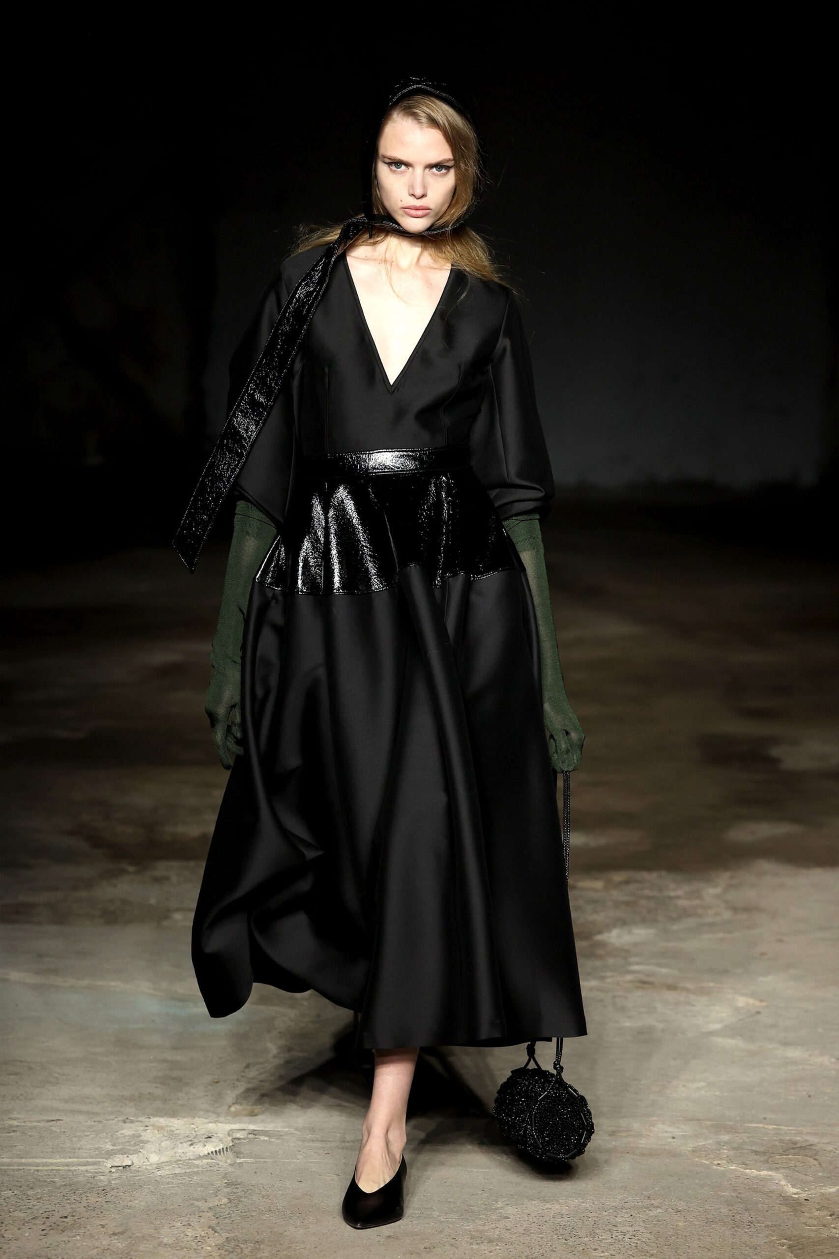black silk midi dress with green gloves