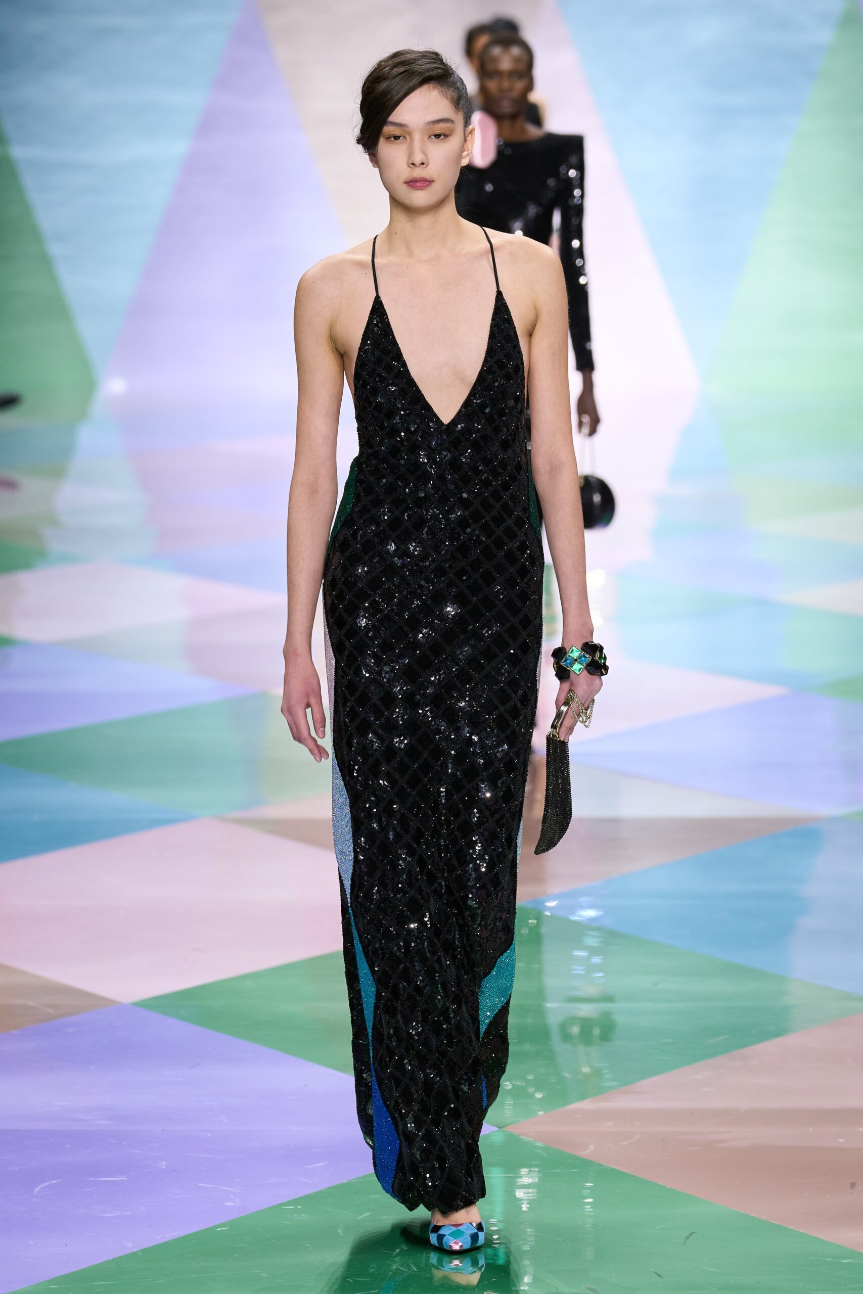 black sequined sleeveless gown