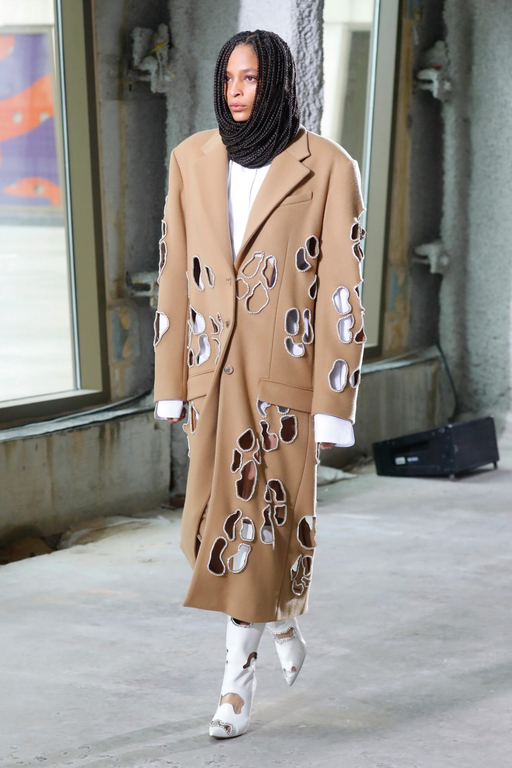 beige oversized coat with cutouts