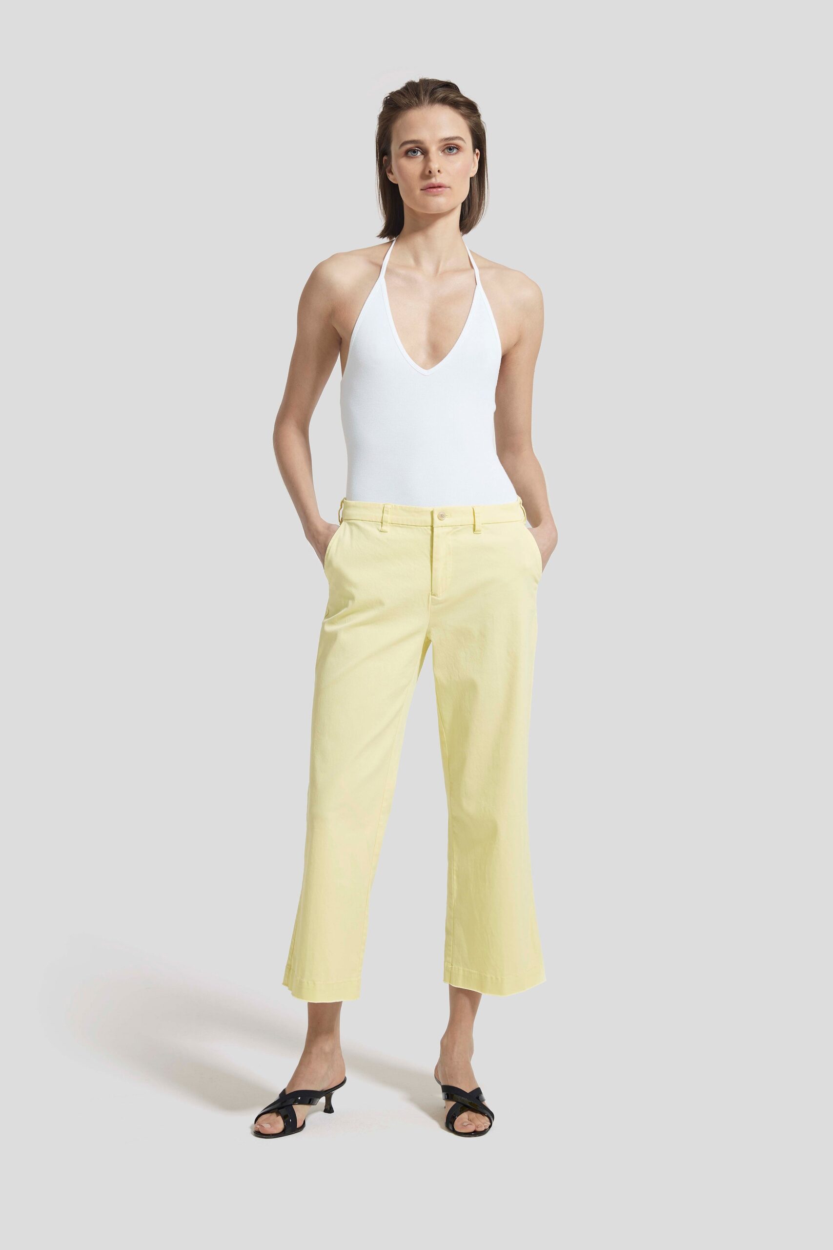 white bodysuit with yellow pants