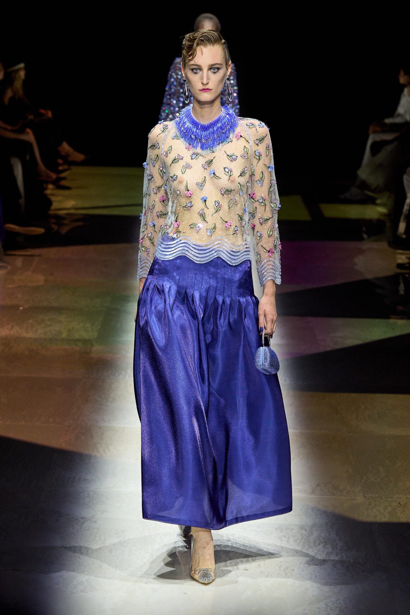 beige embroidered silk top with blue skirt