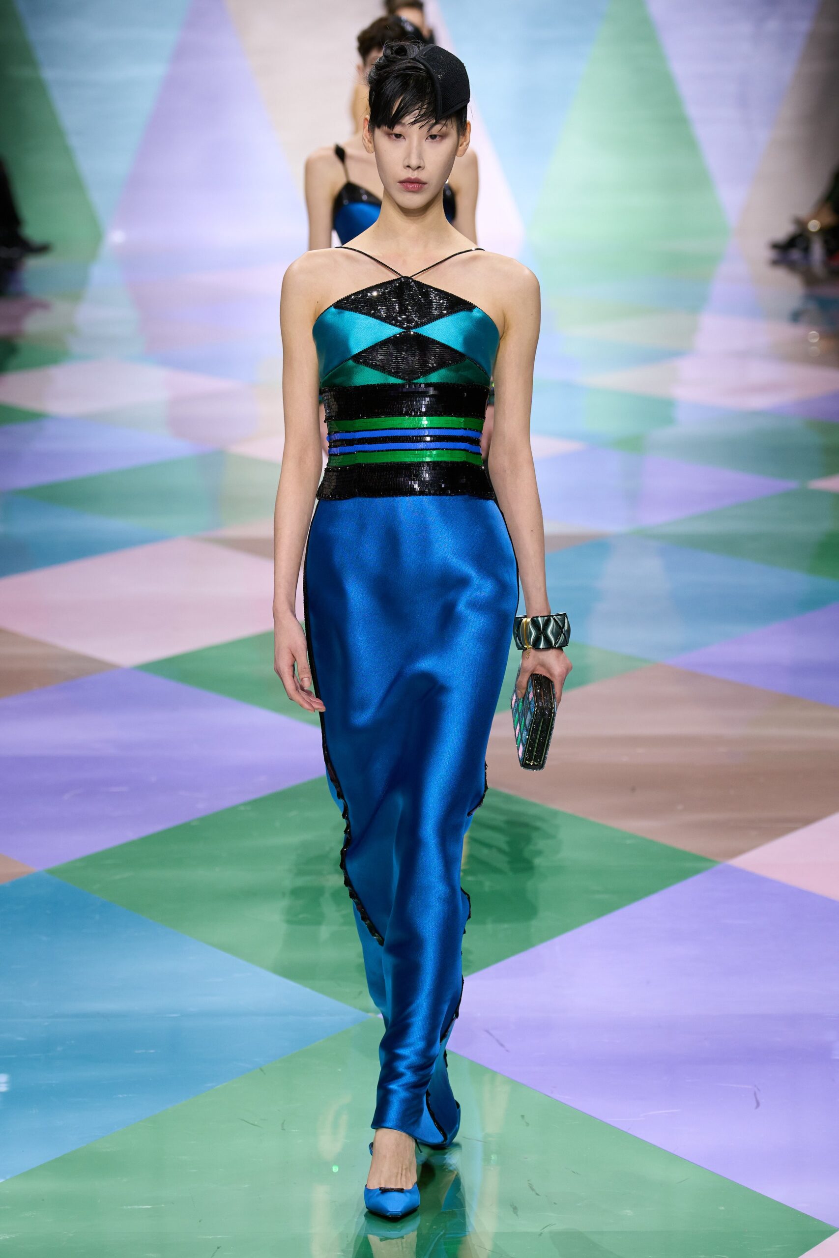 blue fitted gown with clutch