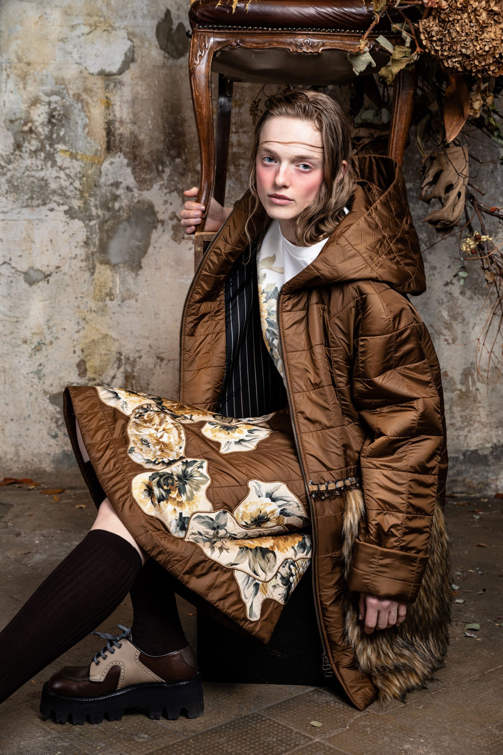 brown faux-fur coat and white dress