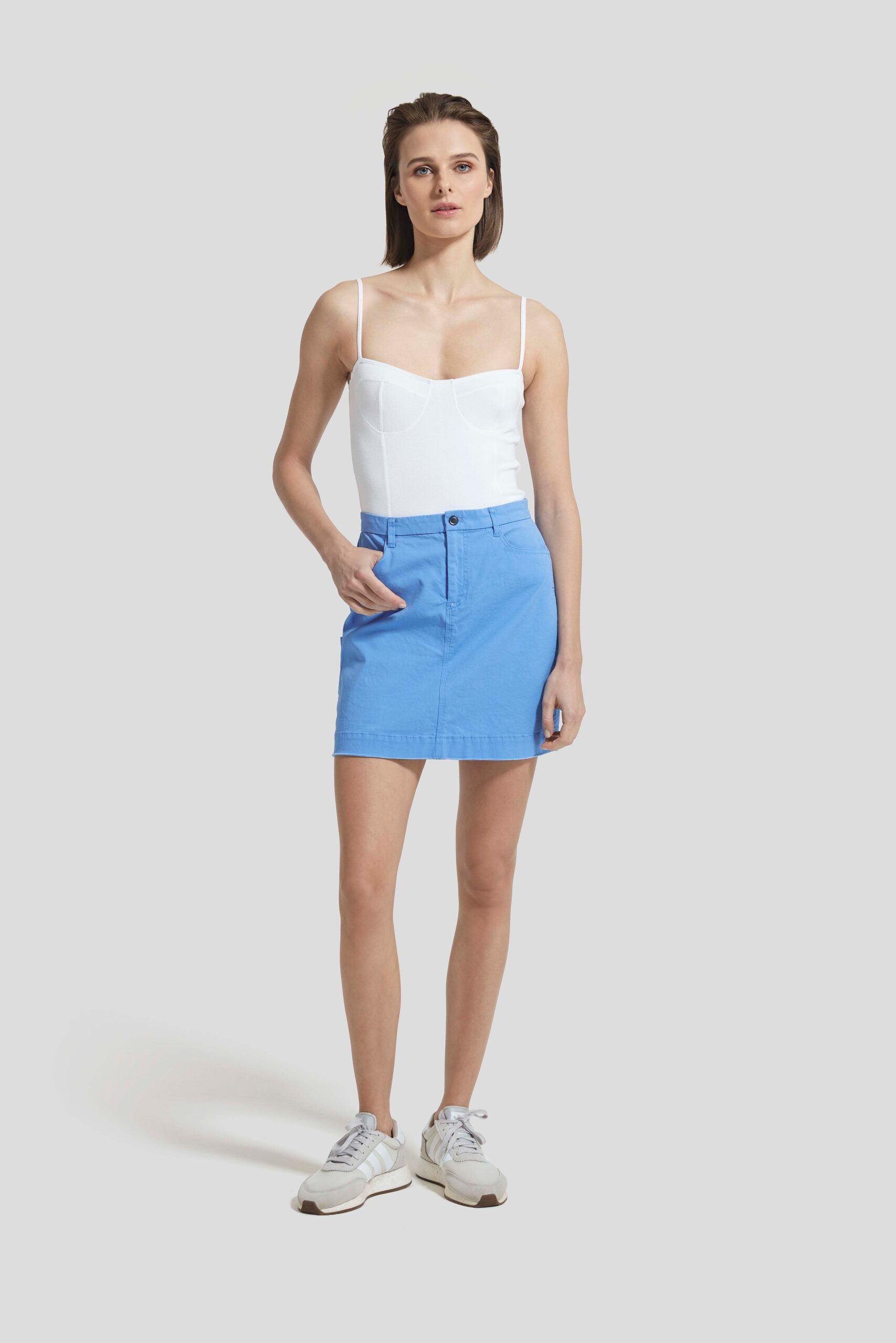 white bodysuit blue skirt