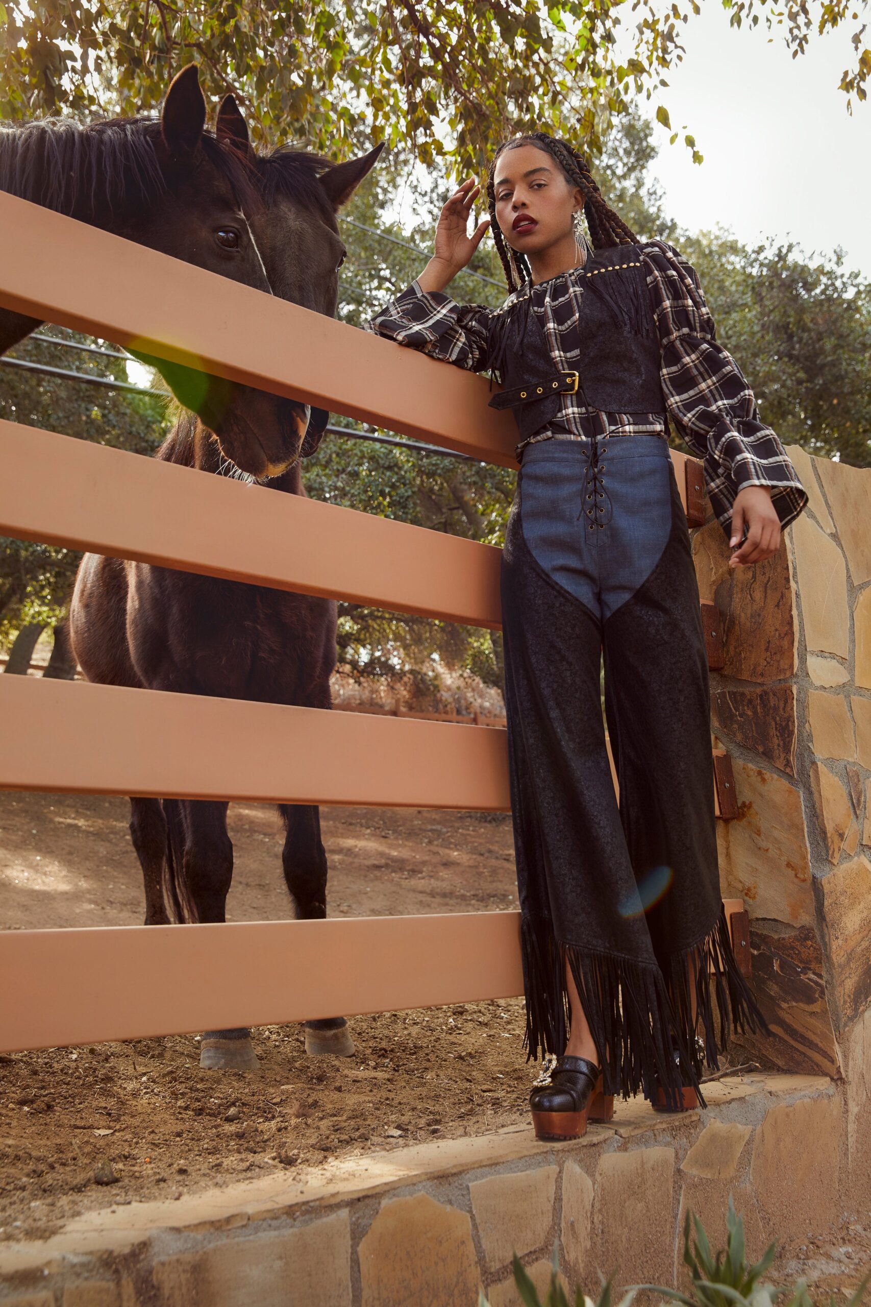 black and white pleated top with flared pants