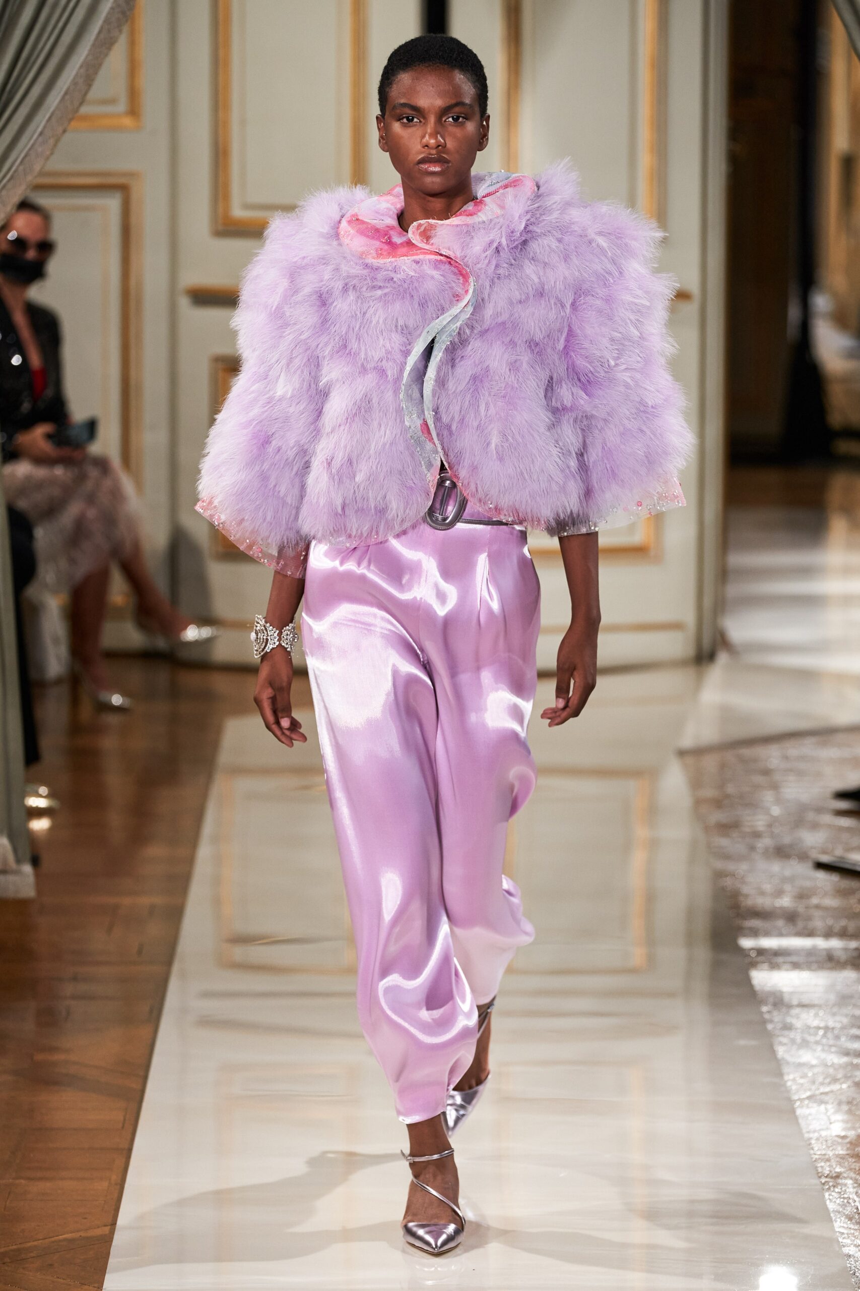 purple faux-fur jacket and pink satin pants