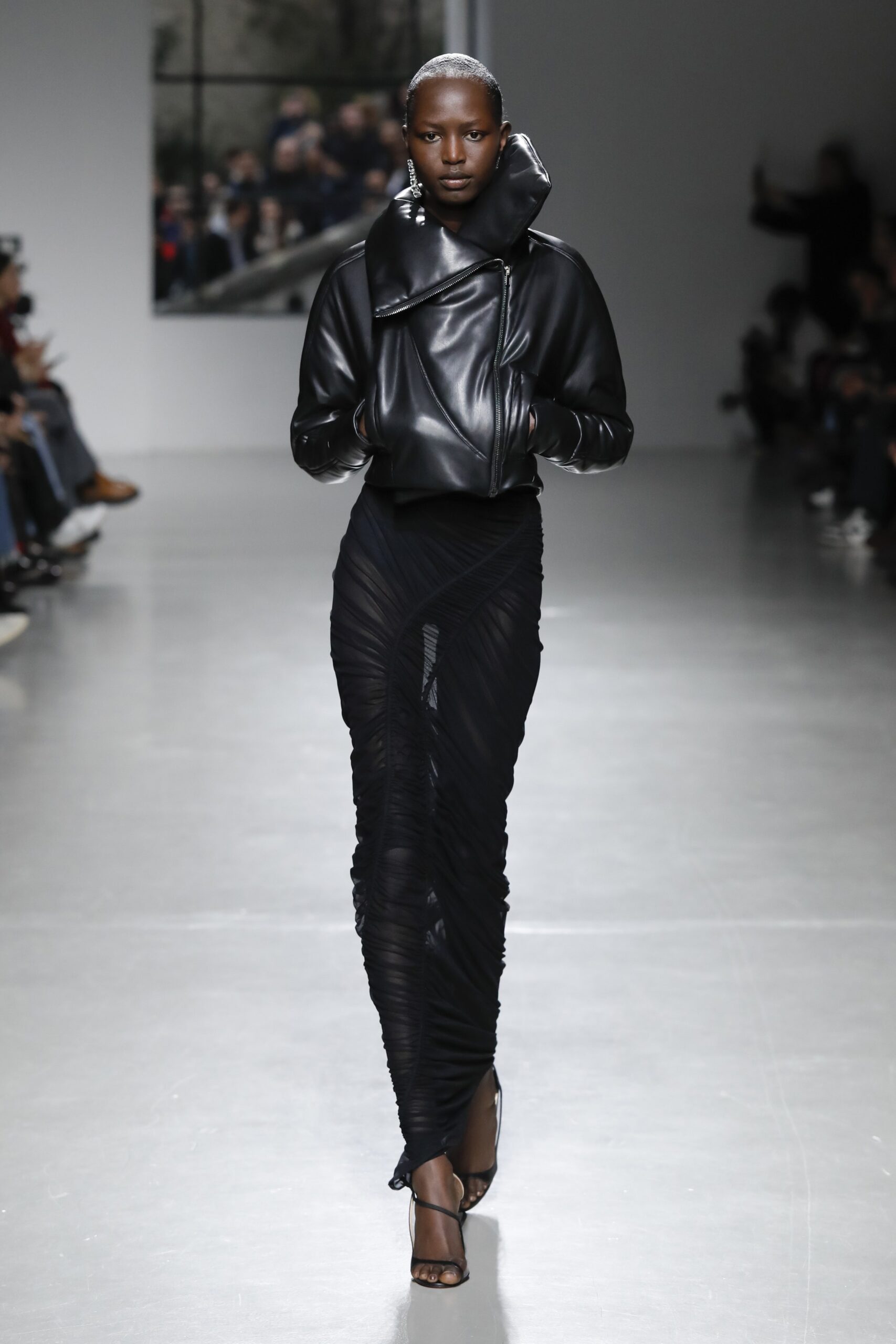 black leather fitted top and midi skirt