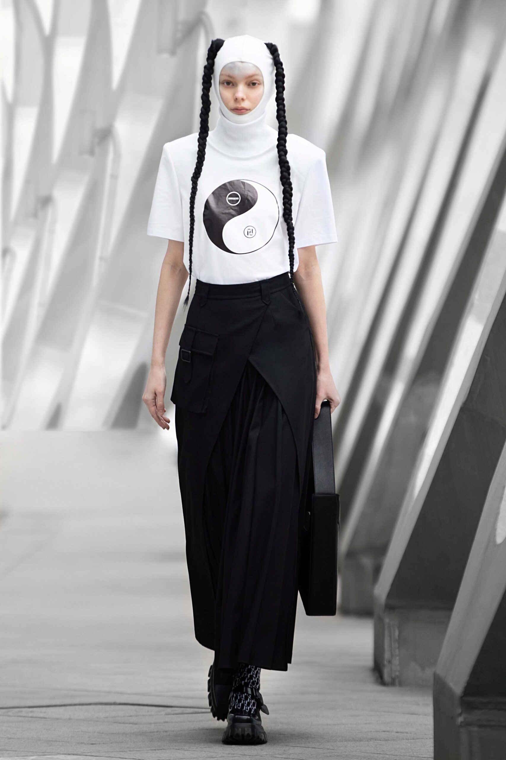 white t-shirt and black skirt