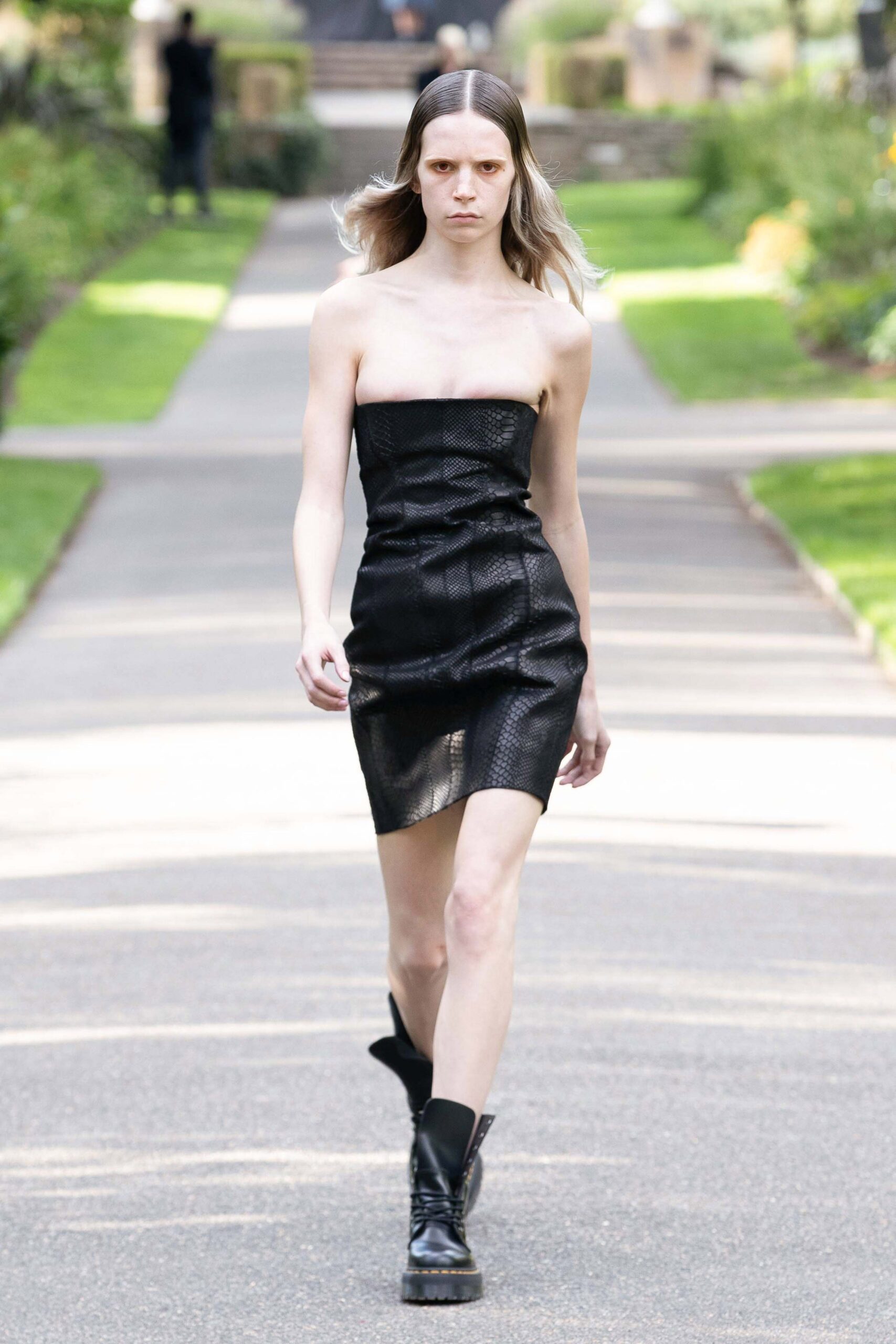 black leather strapless mini dress with boots