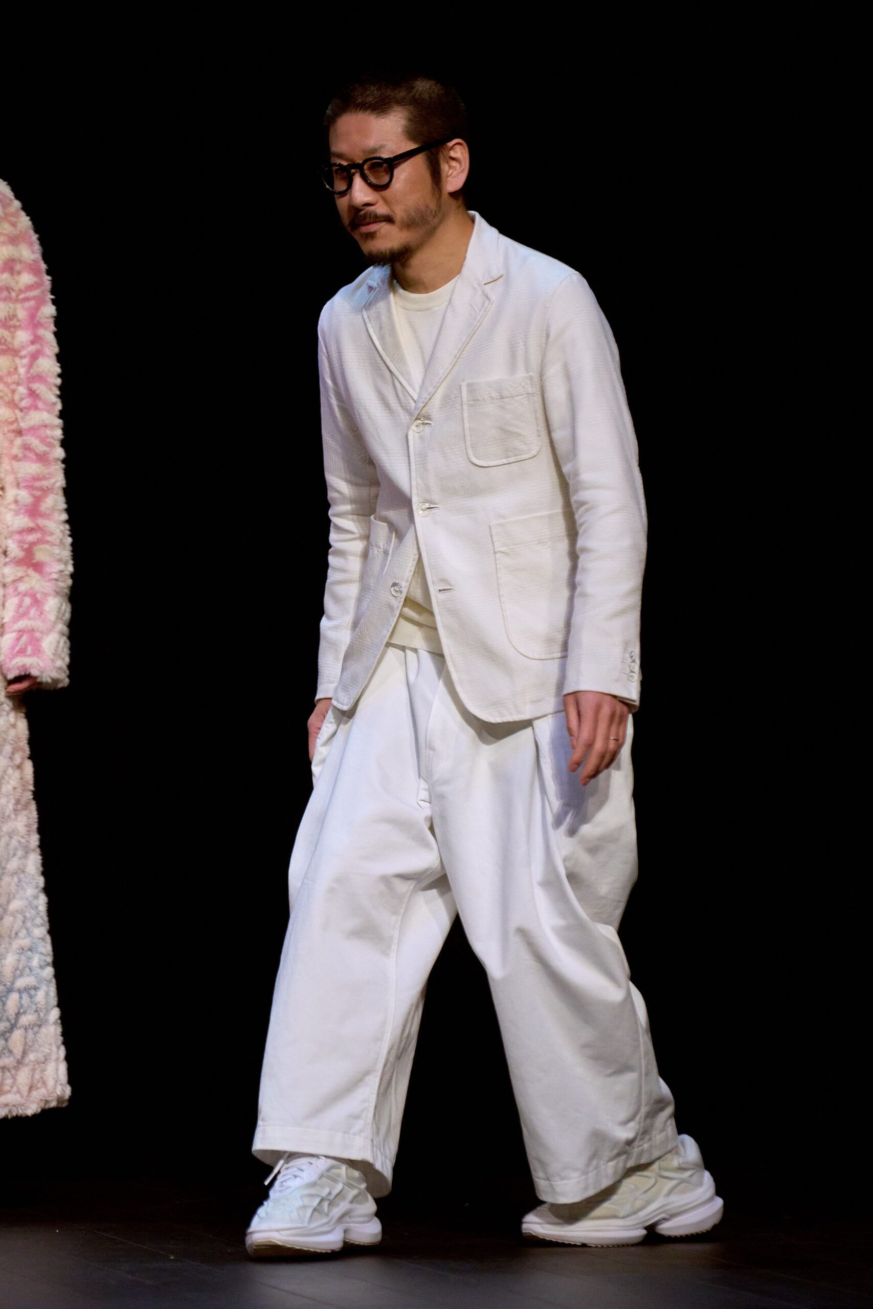 white relaxed suit with wide-leg pants