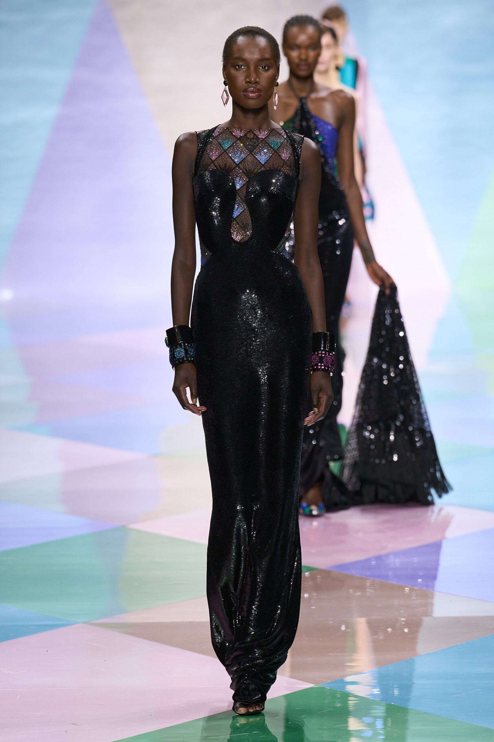 black sequined sleeveless gown