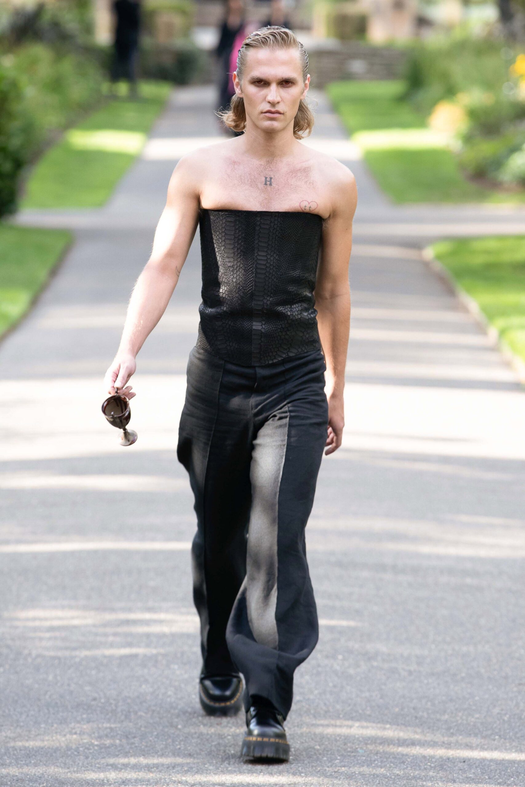 black corset and relaxed pants