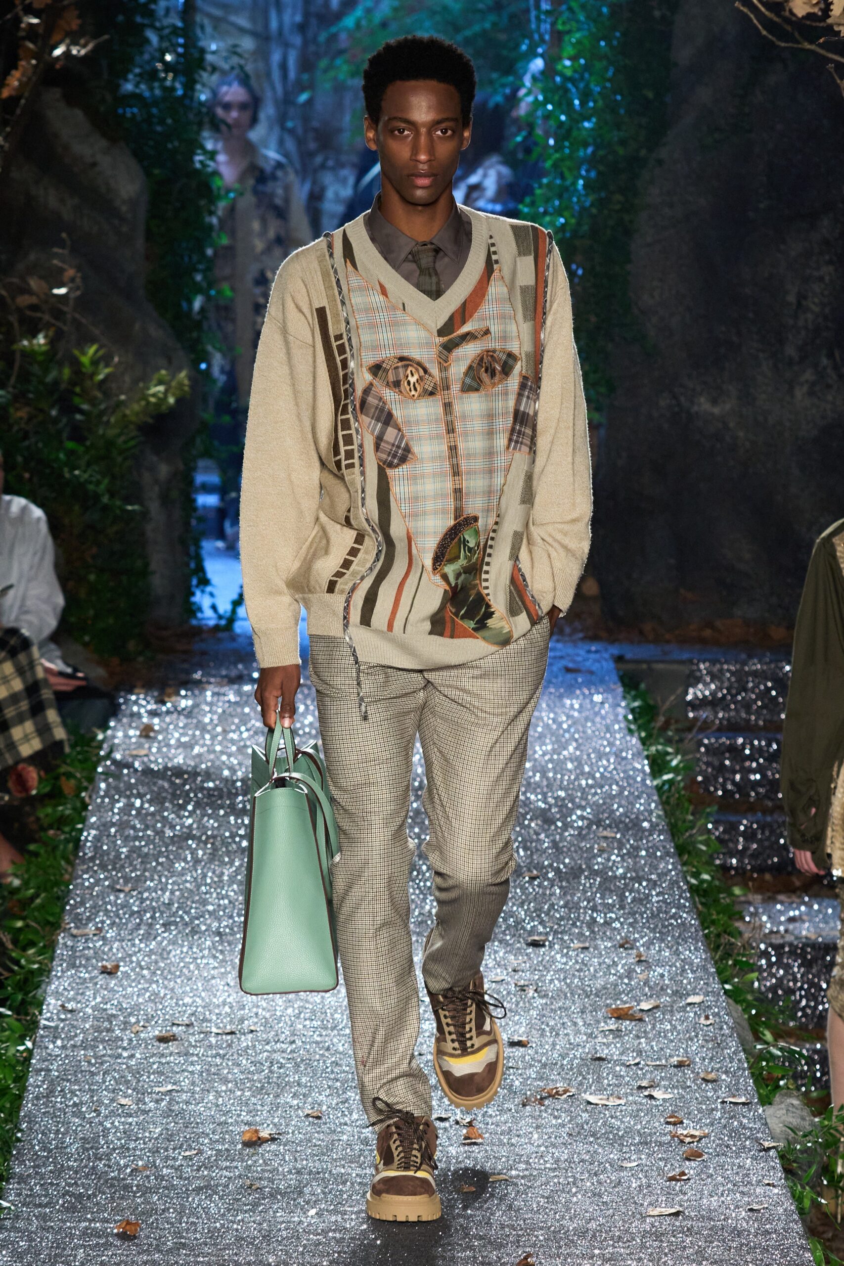 beige relaxed sweater with checked pants