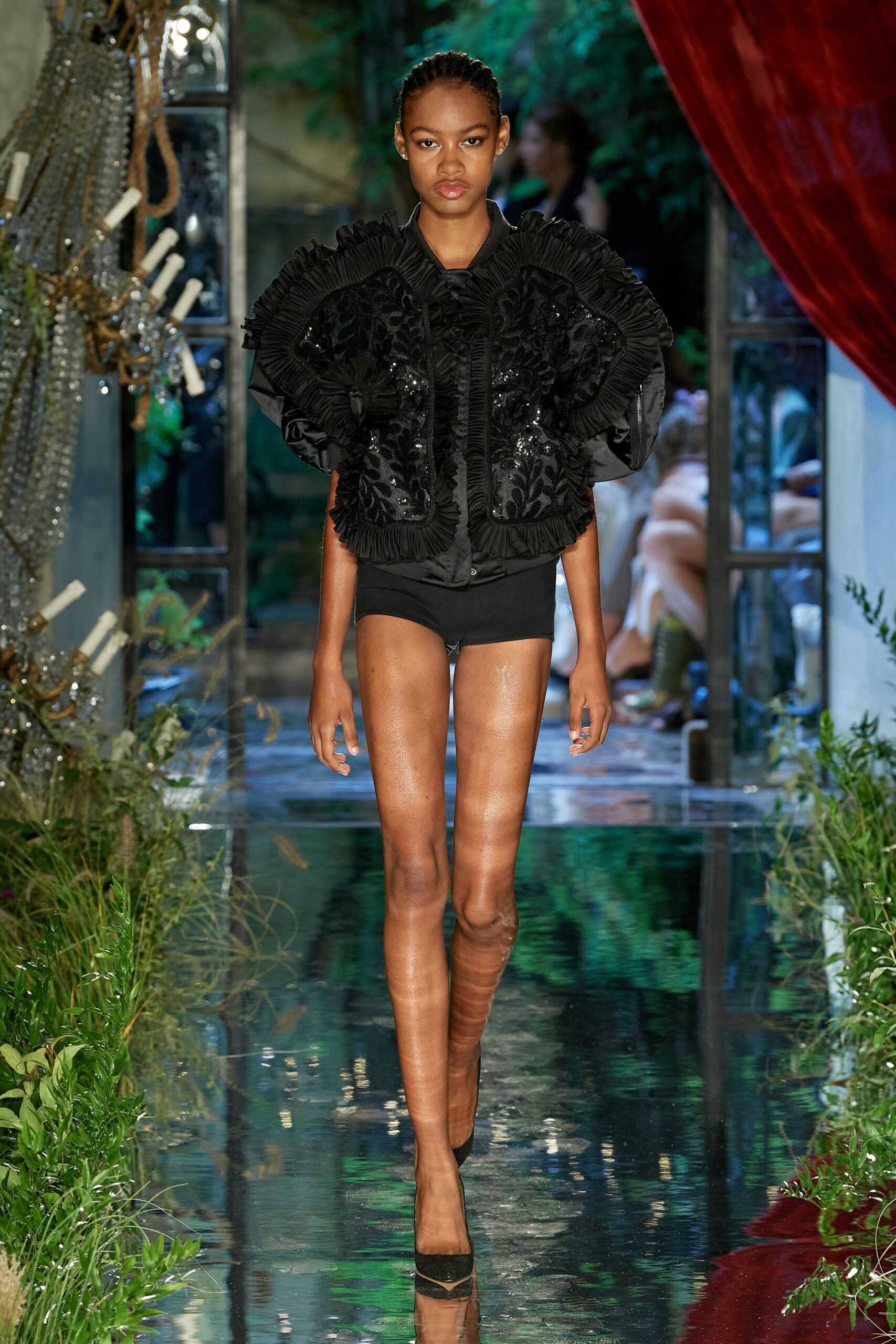 black ruffled jacket with shorts