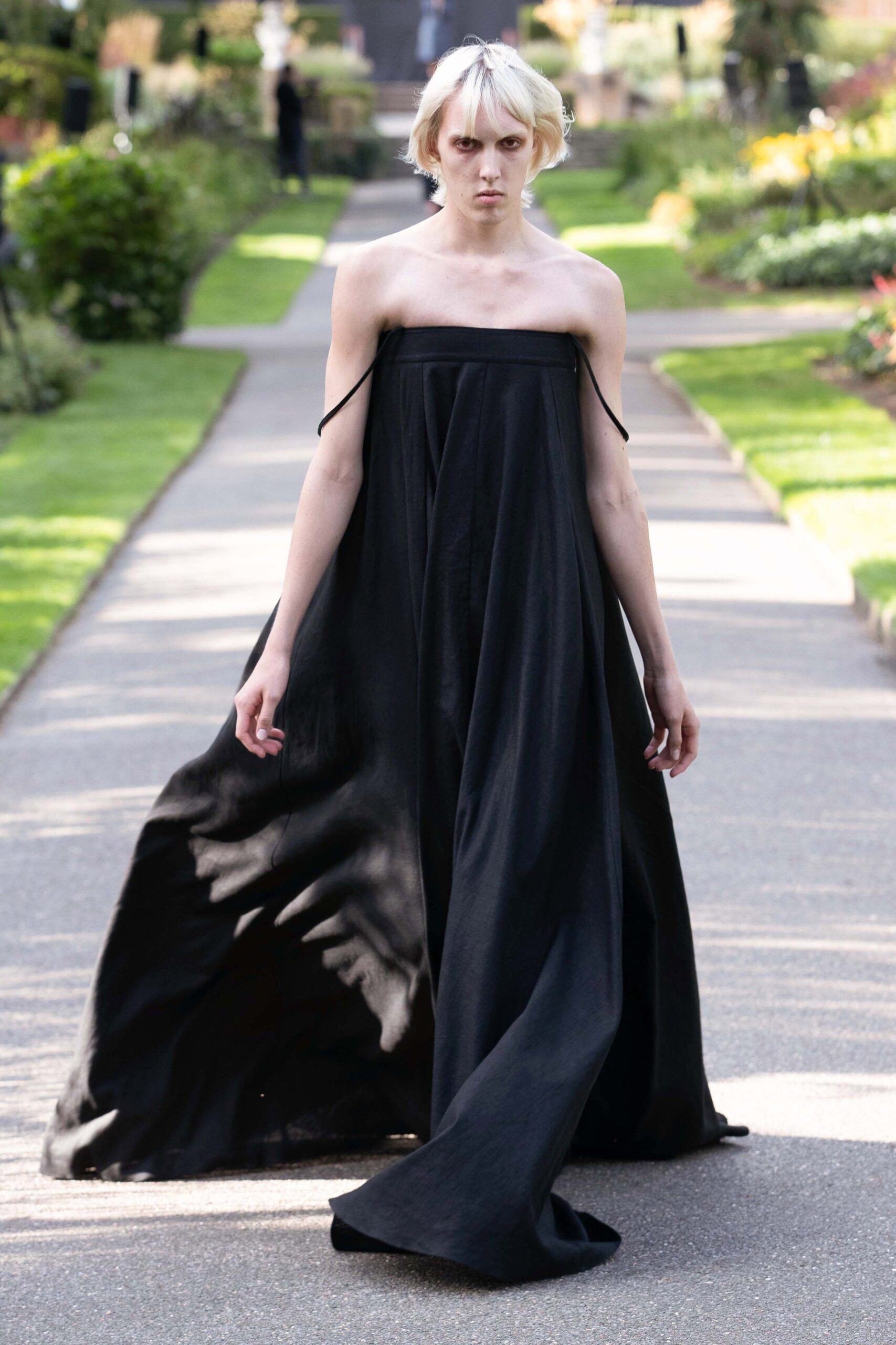 black strapless flowing gown