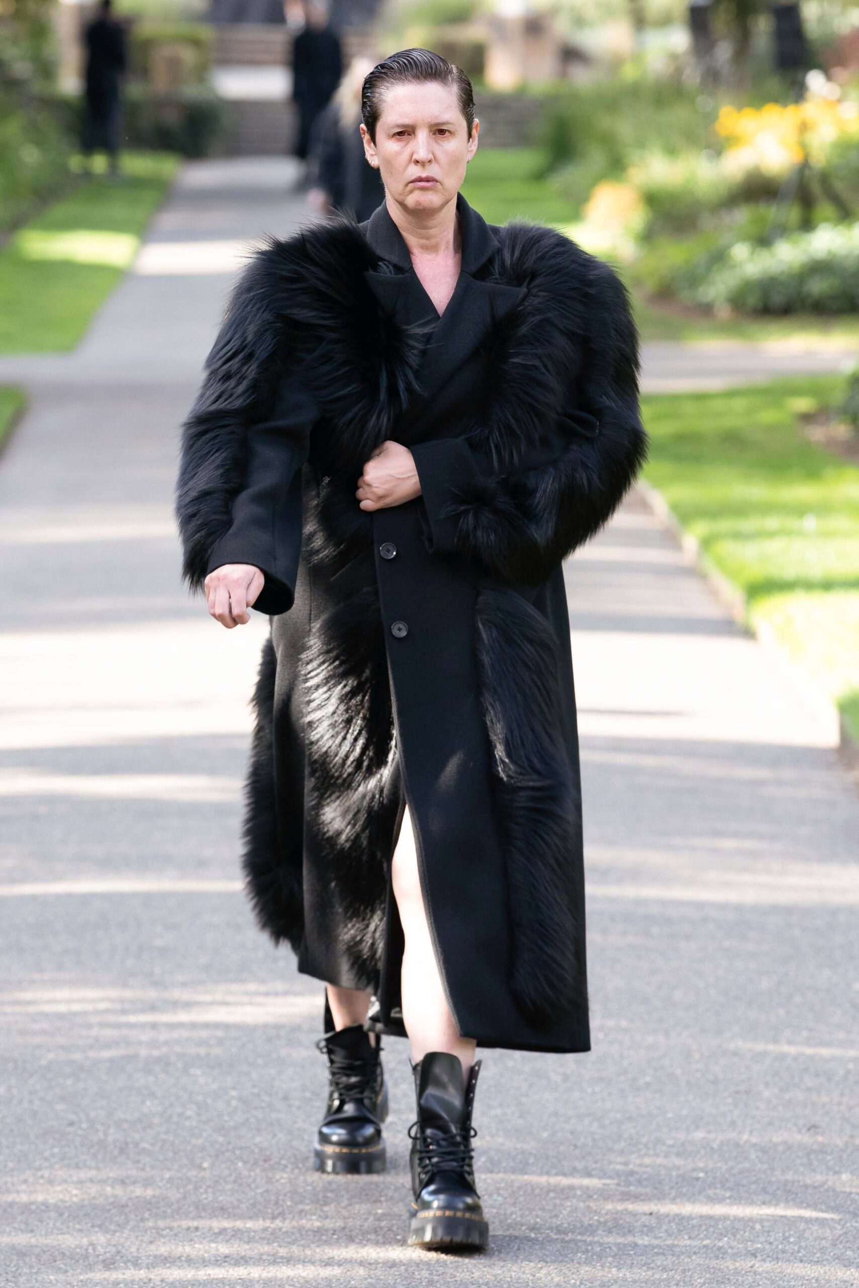 black faux-fur coat and dress