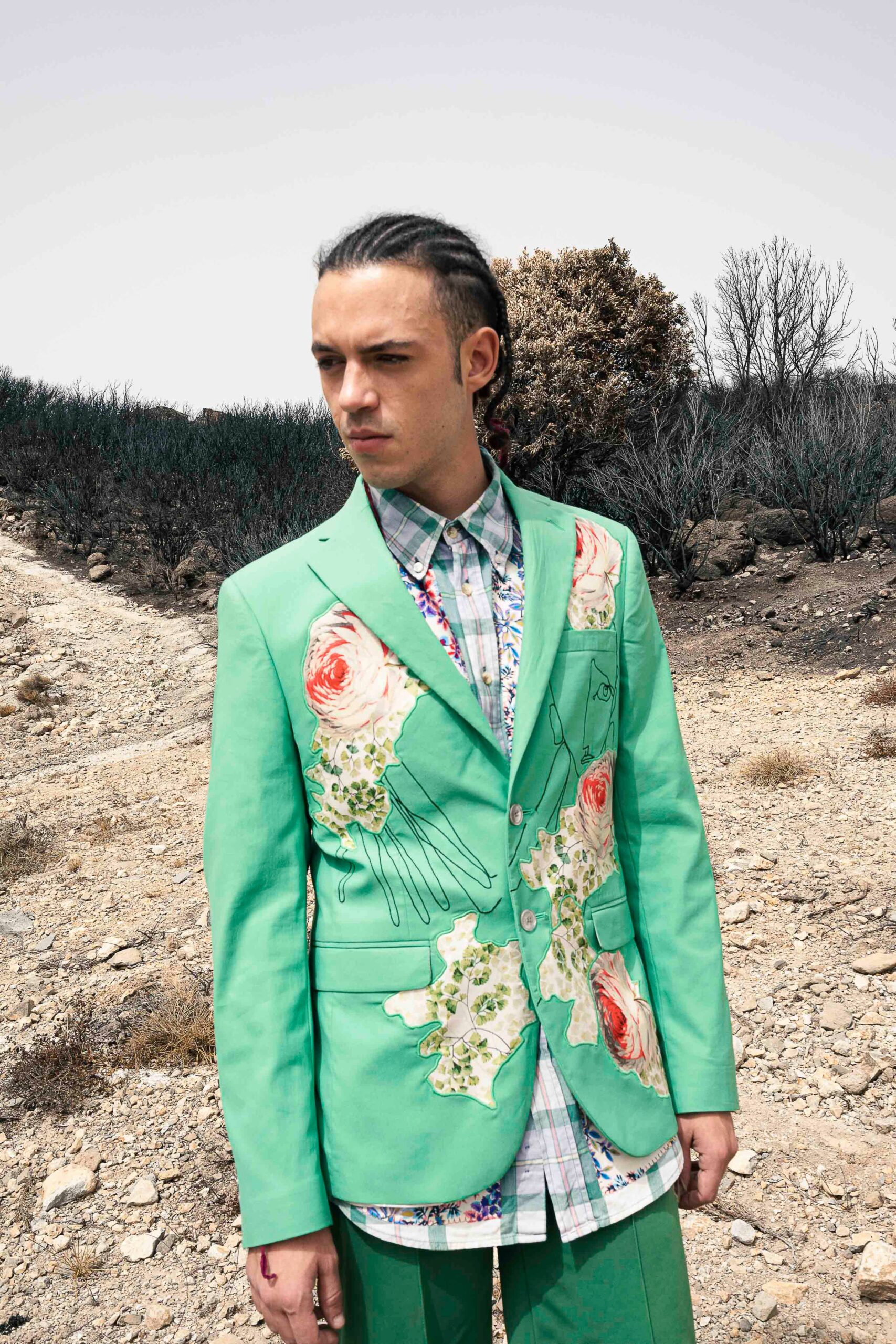 green embroidered blazer with checked shirt