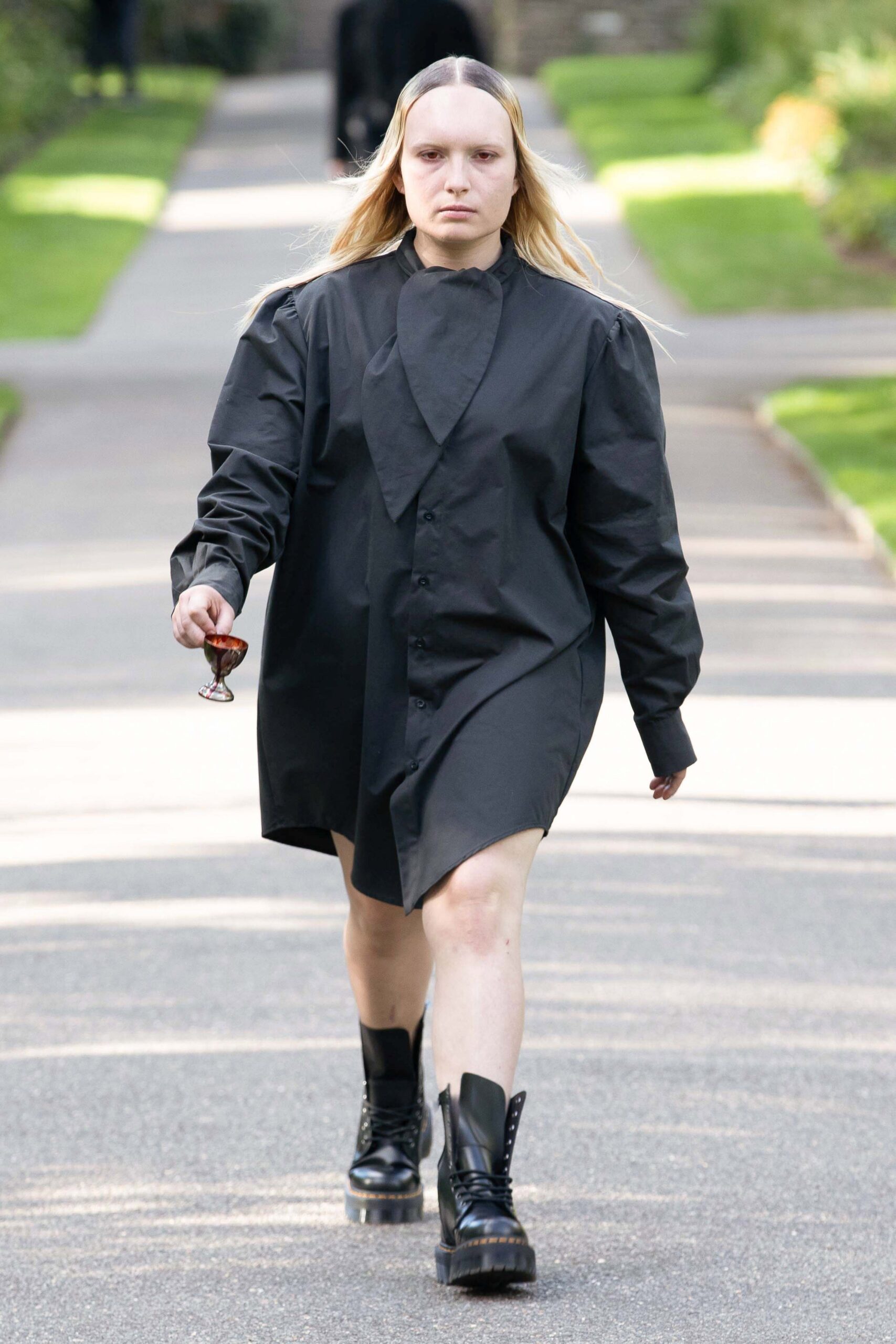 black relaxed mini dress with boots