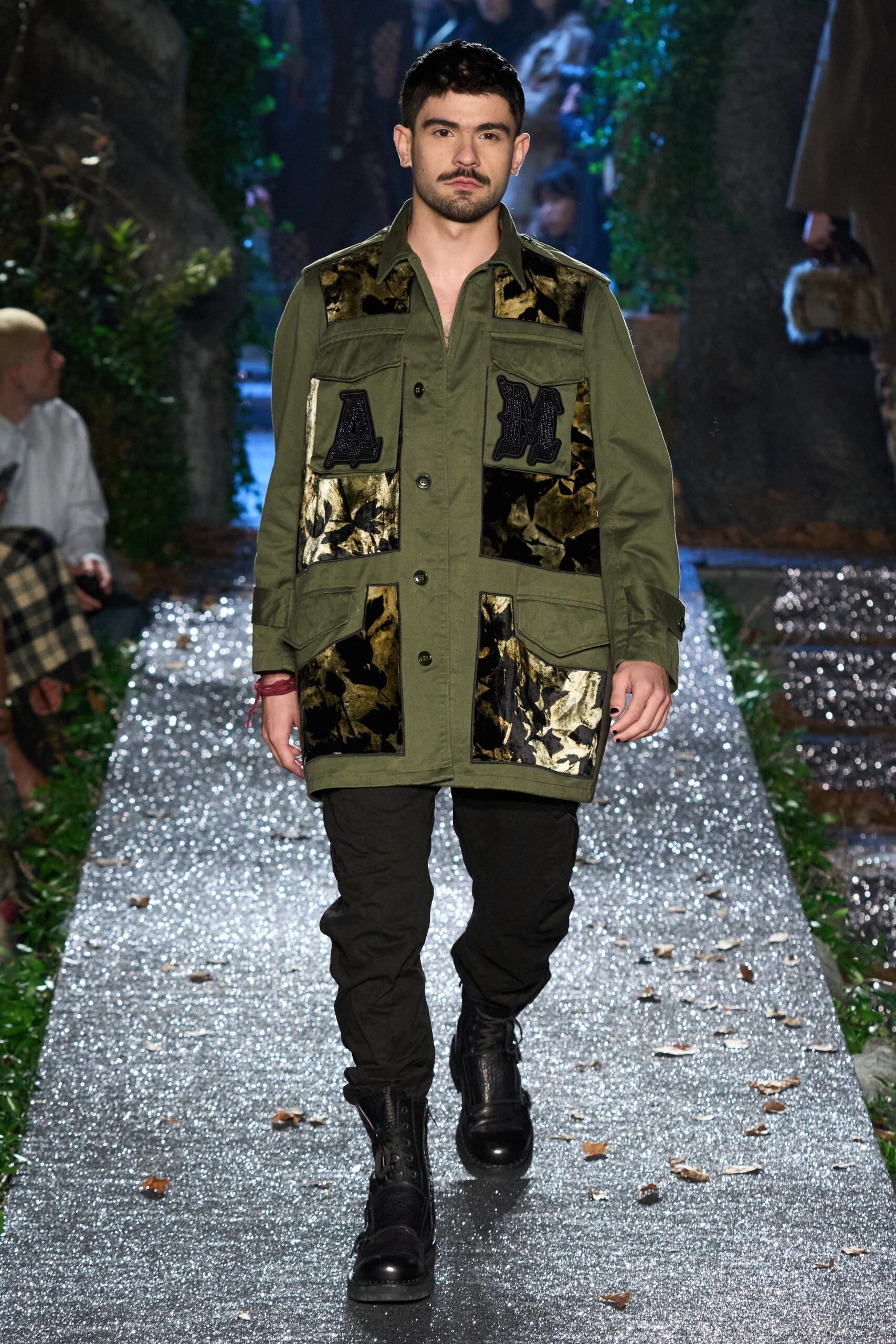green jacket black pants
