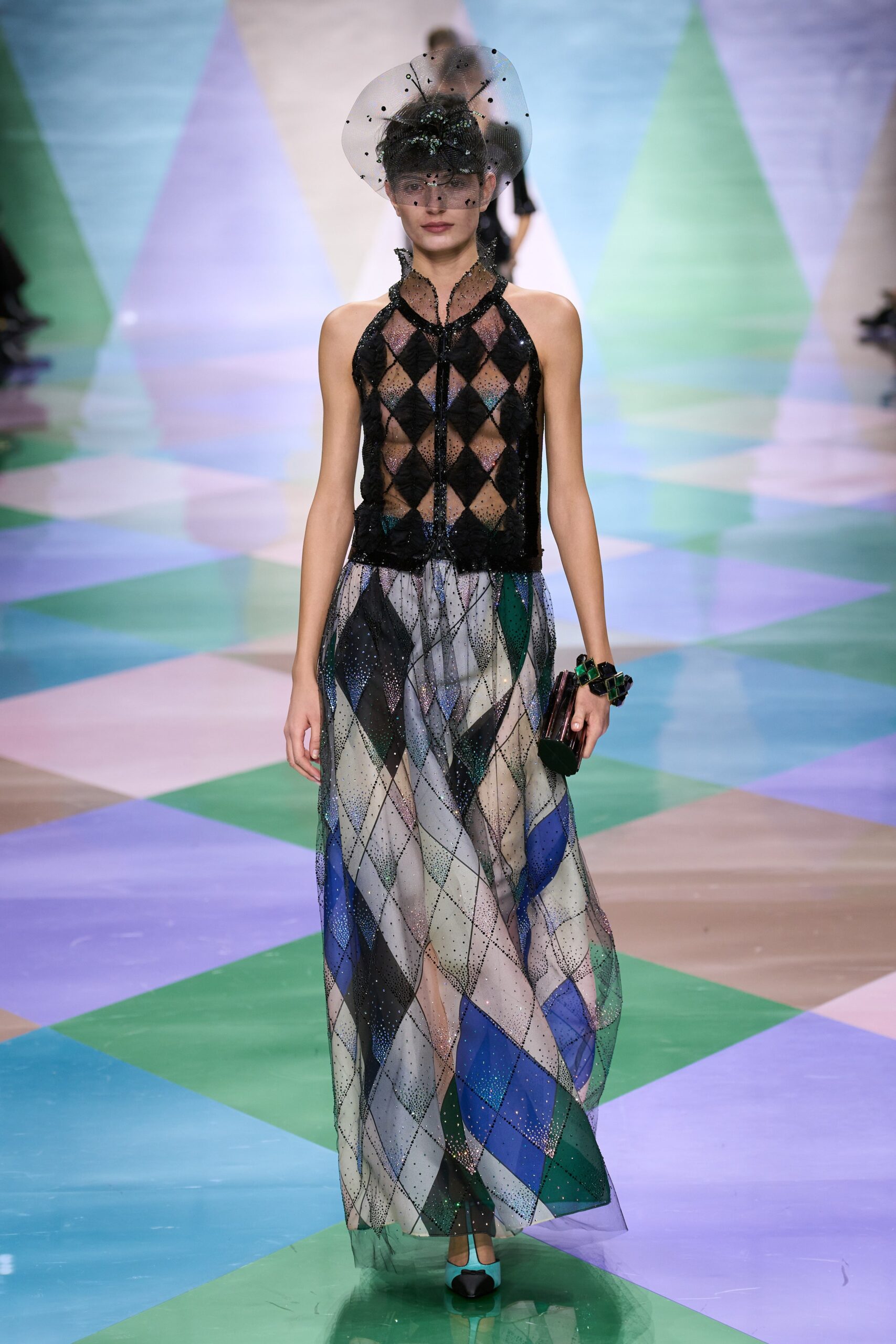 black lace sleeveless top with multi-tiered skirt