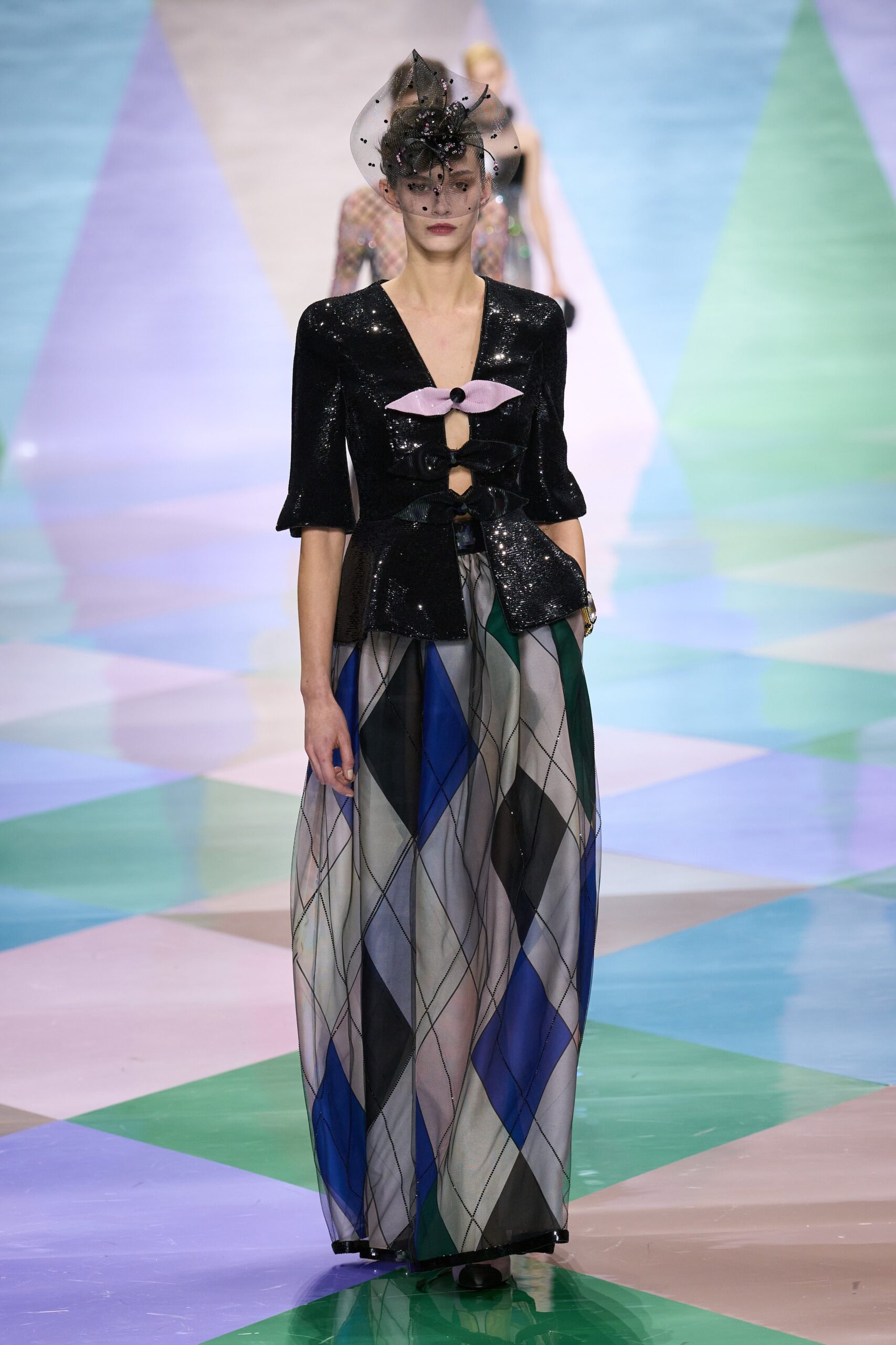 black silk blouse with multi pleated skirt
