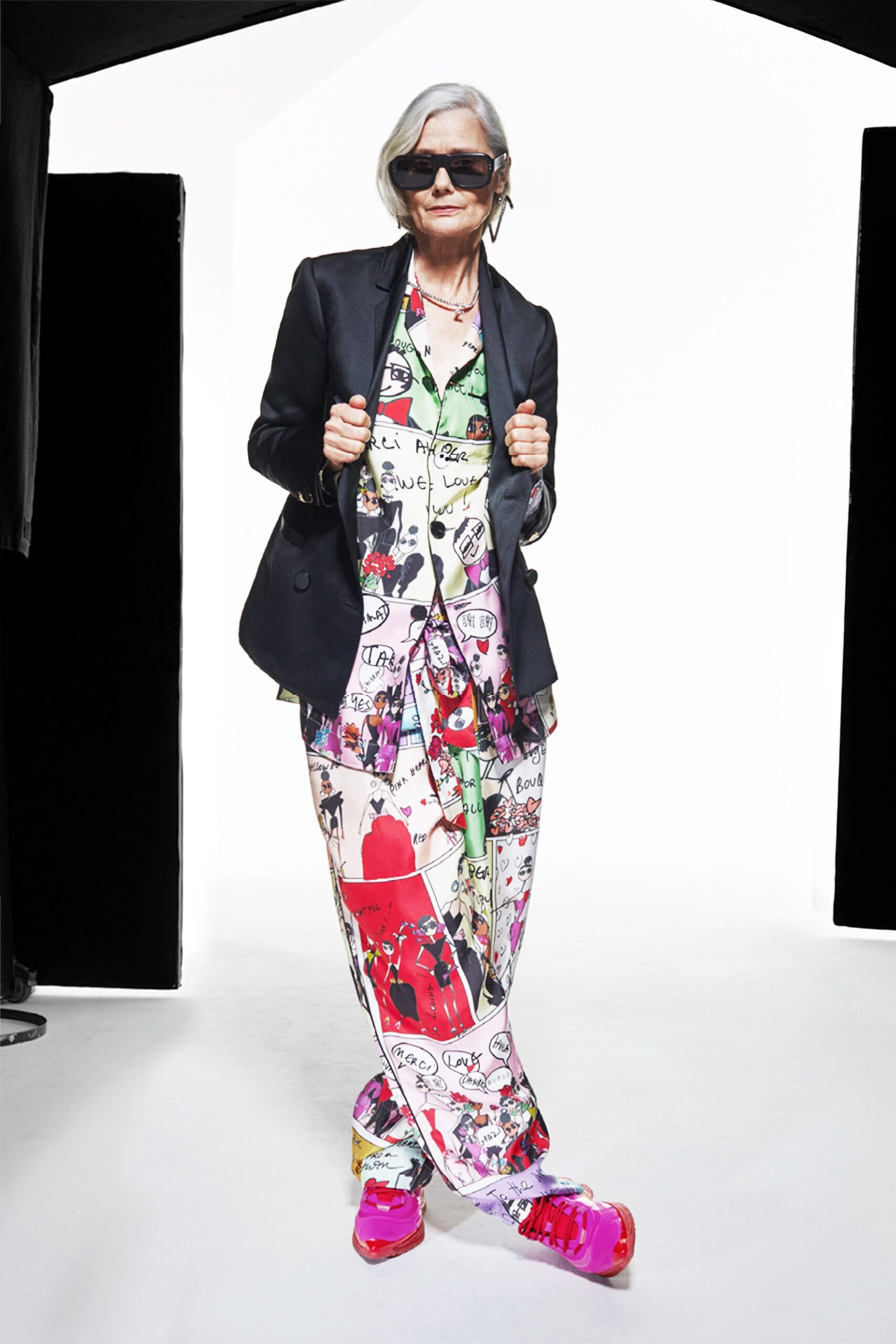 black tailored blazer with printed pants