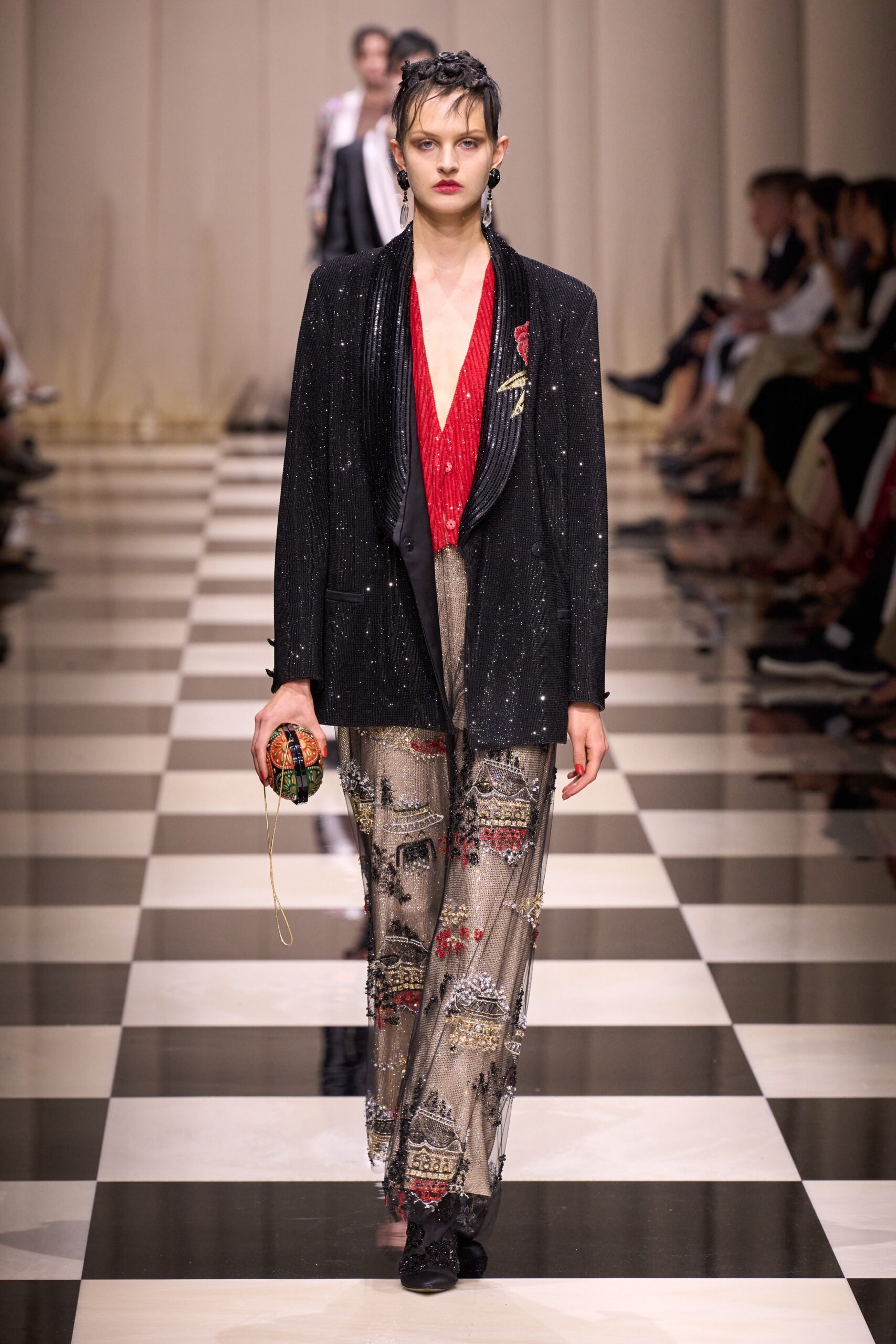 black sequined blazer with printed pants