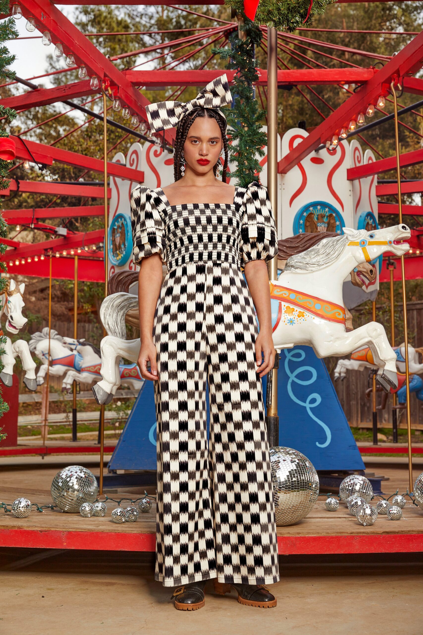 black and white checked jumpsuit with bow headband