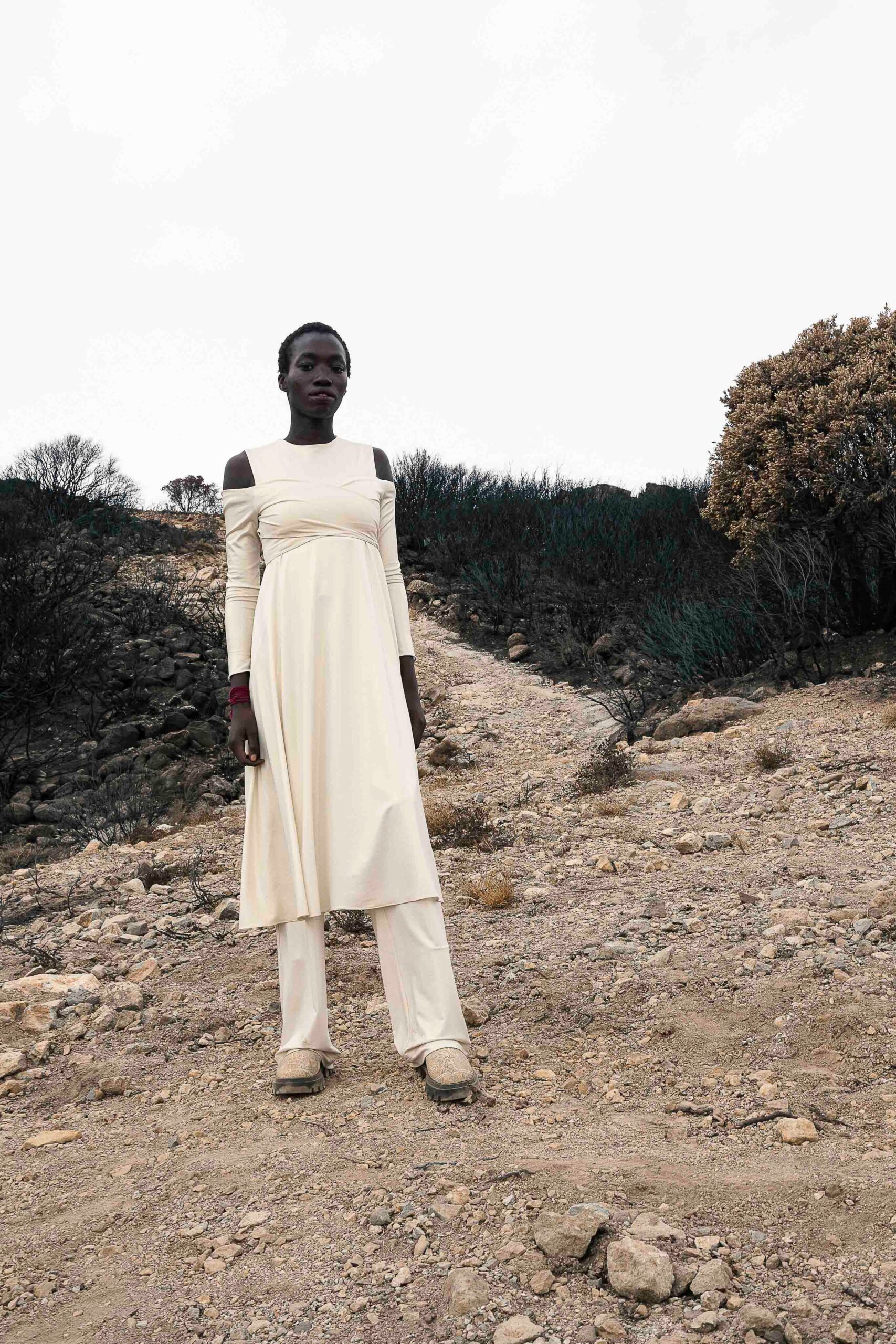 white cotton long-sleeve off-shoulder fitted draped midi dress