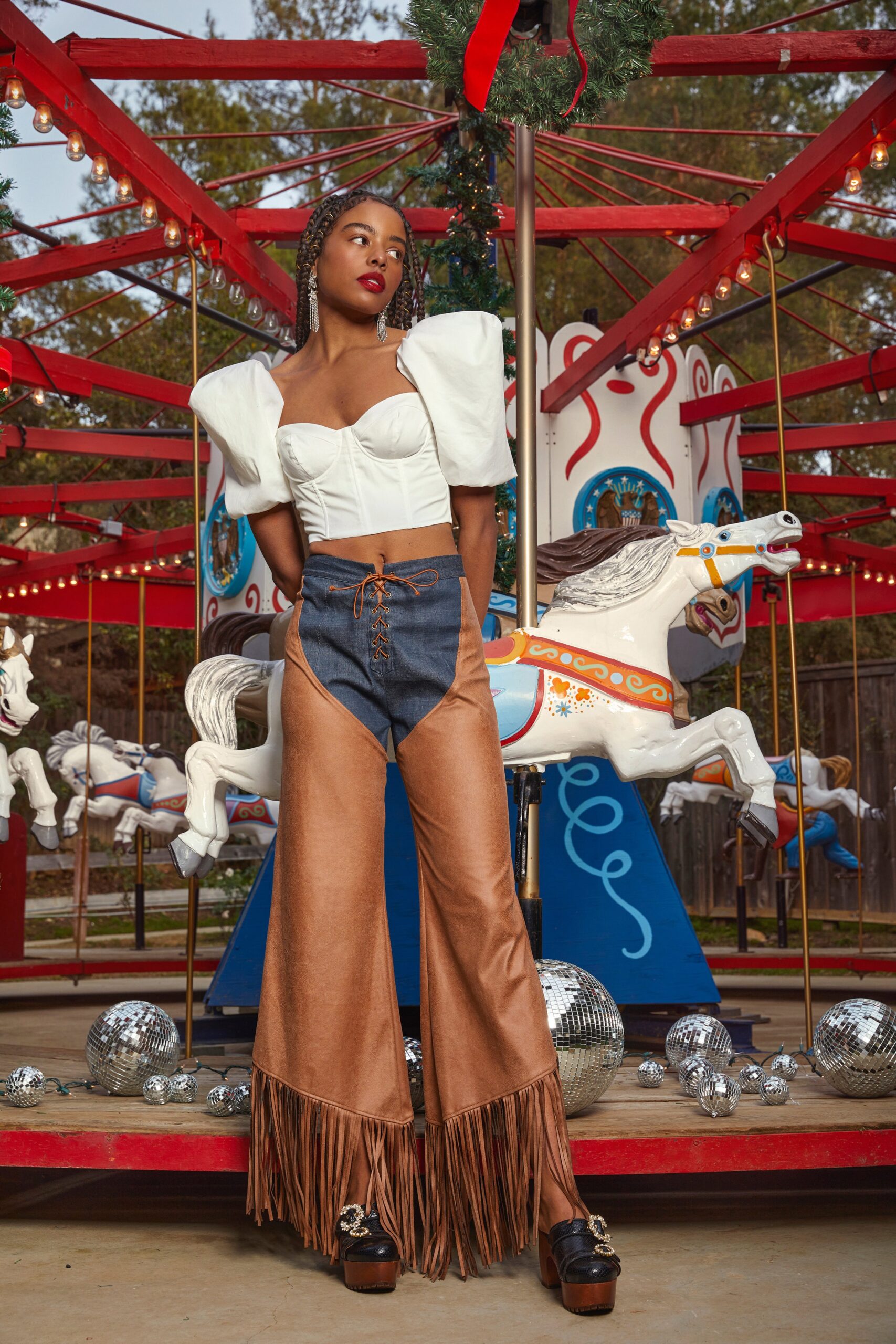white fitted top with brown pants