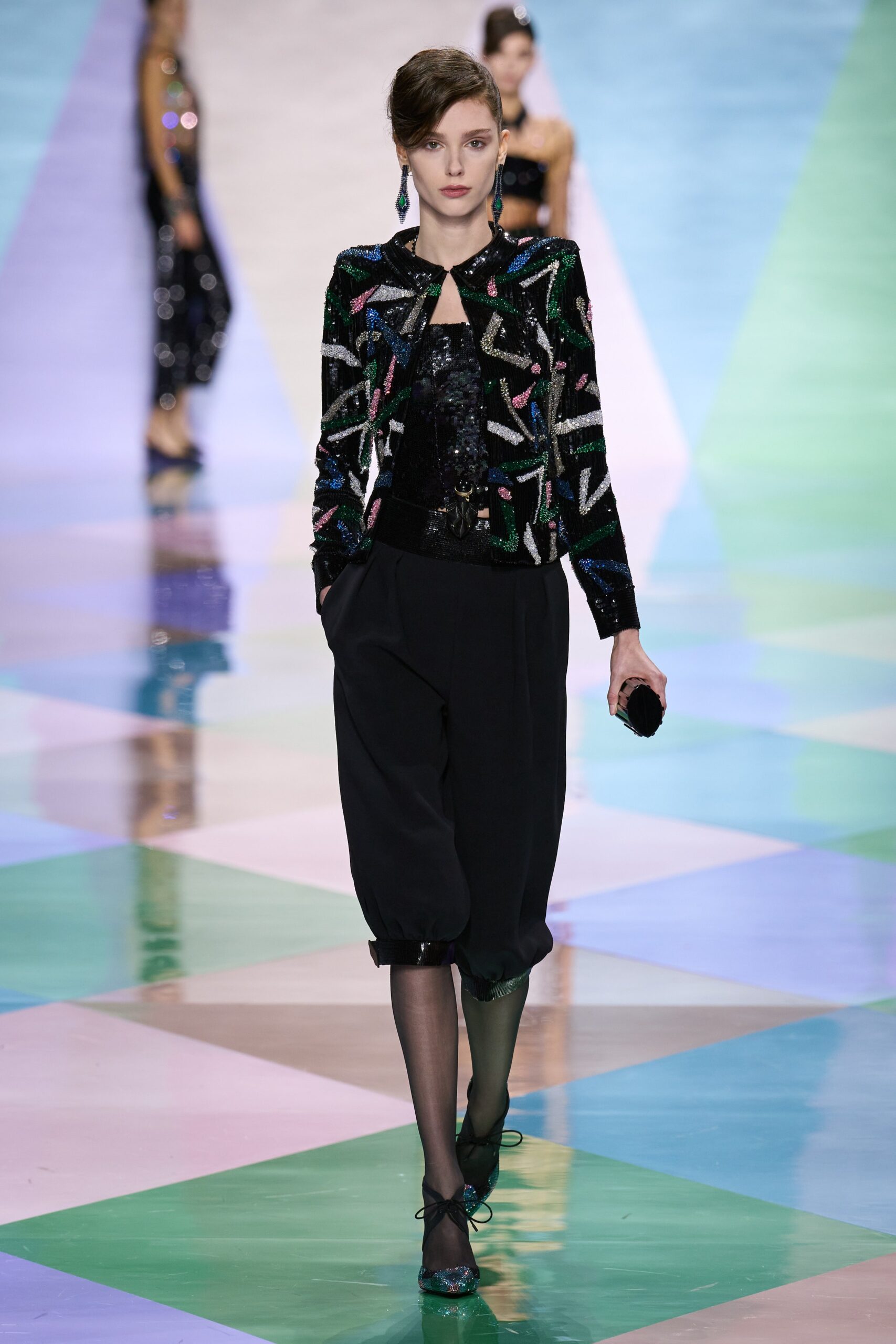 black sequin fitted jacket and relaxed pants
