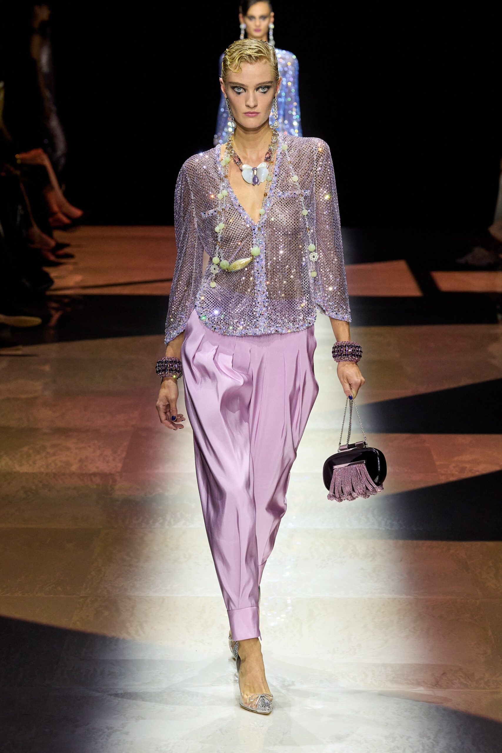 purple sequined blouse with pink pants