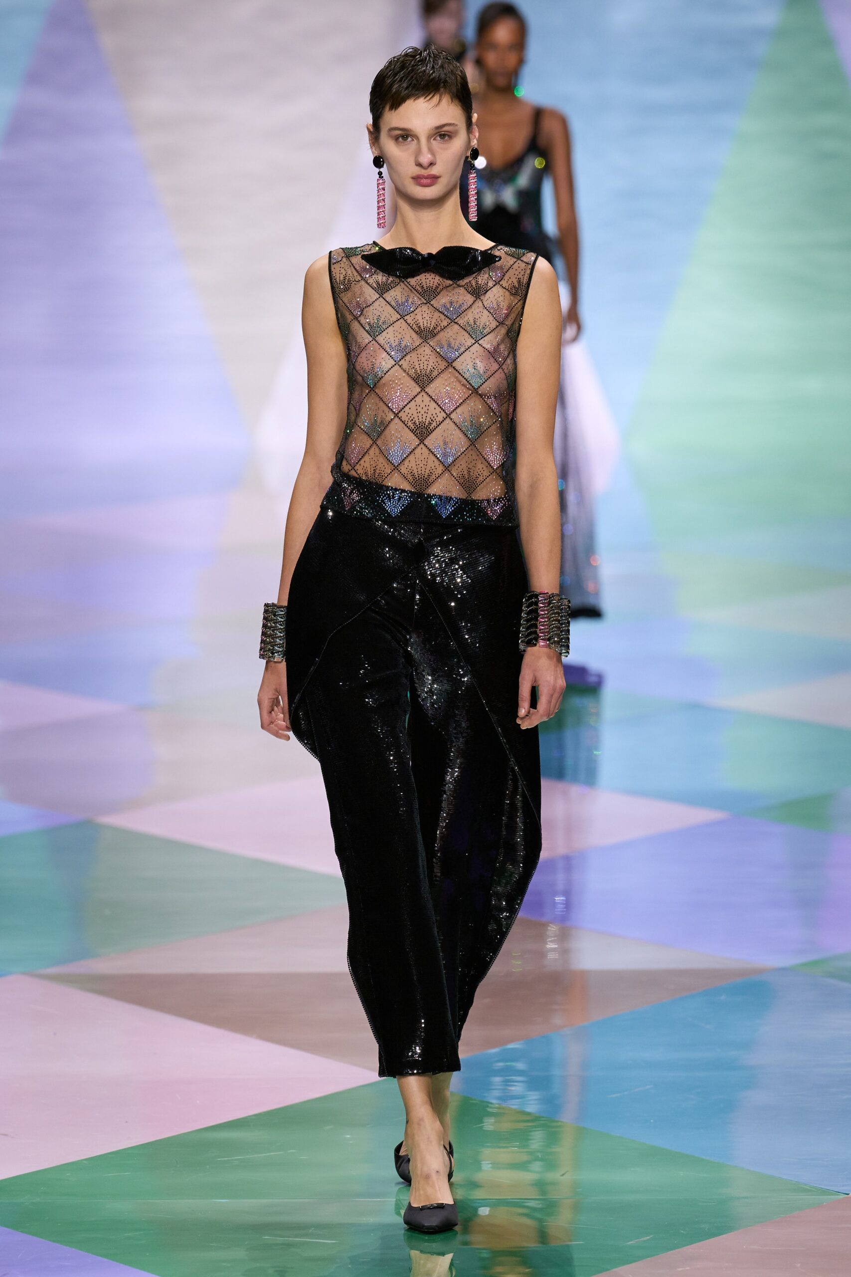 black mesh top and sequined pants