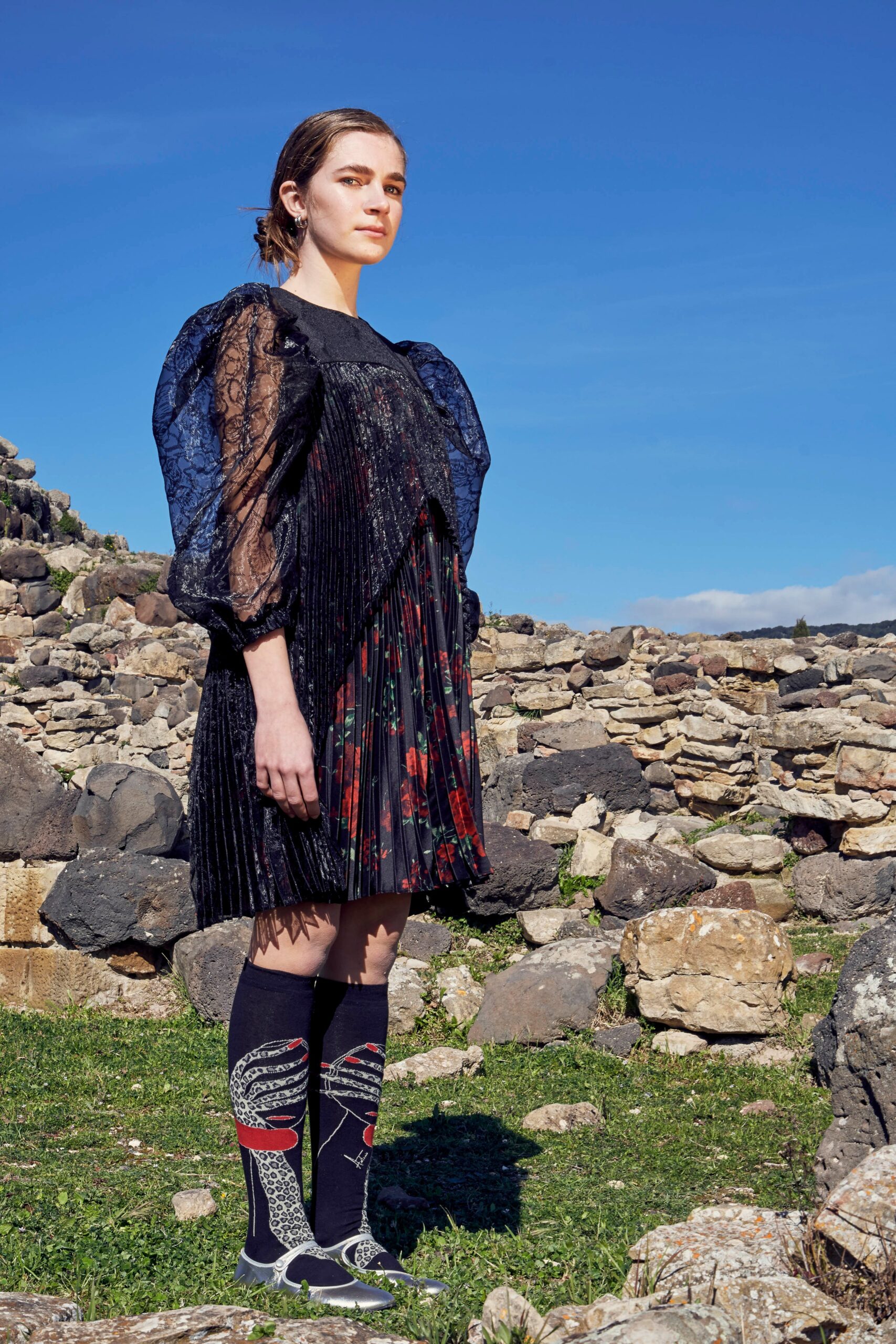 black pleated mini dress with printed socks