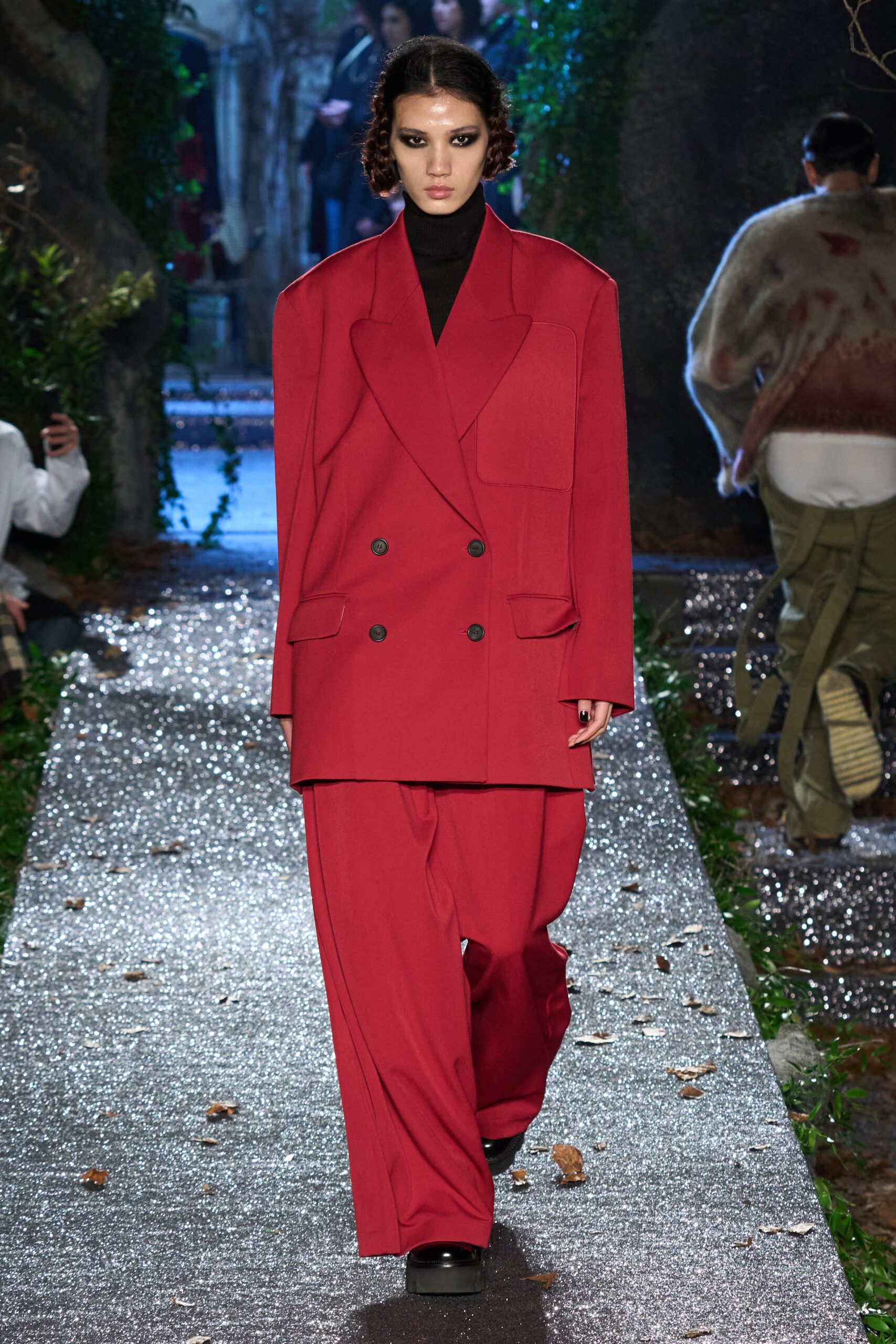 red oversized blazer with black turtleneck