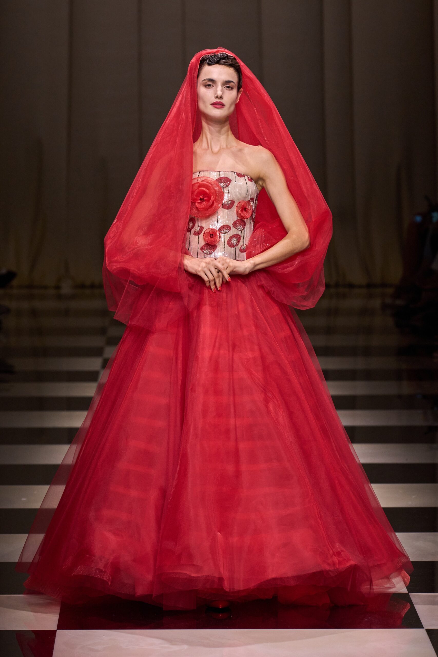 red tiered gown with veil